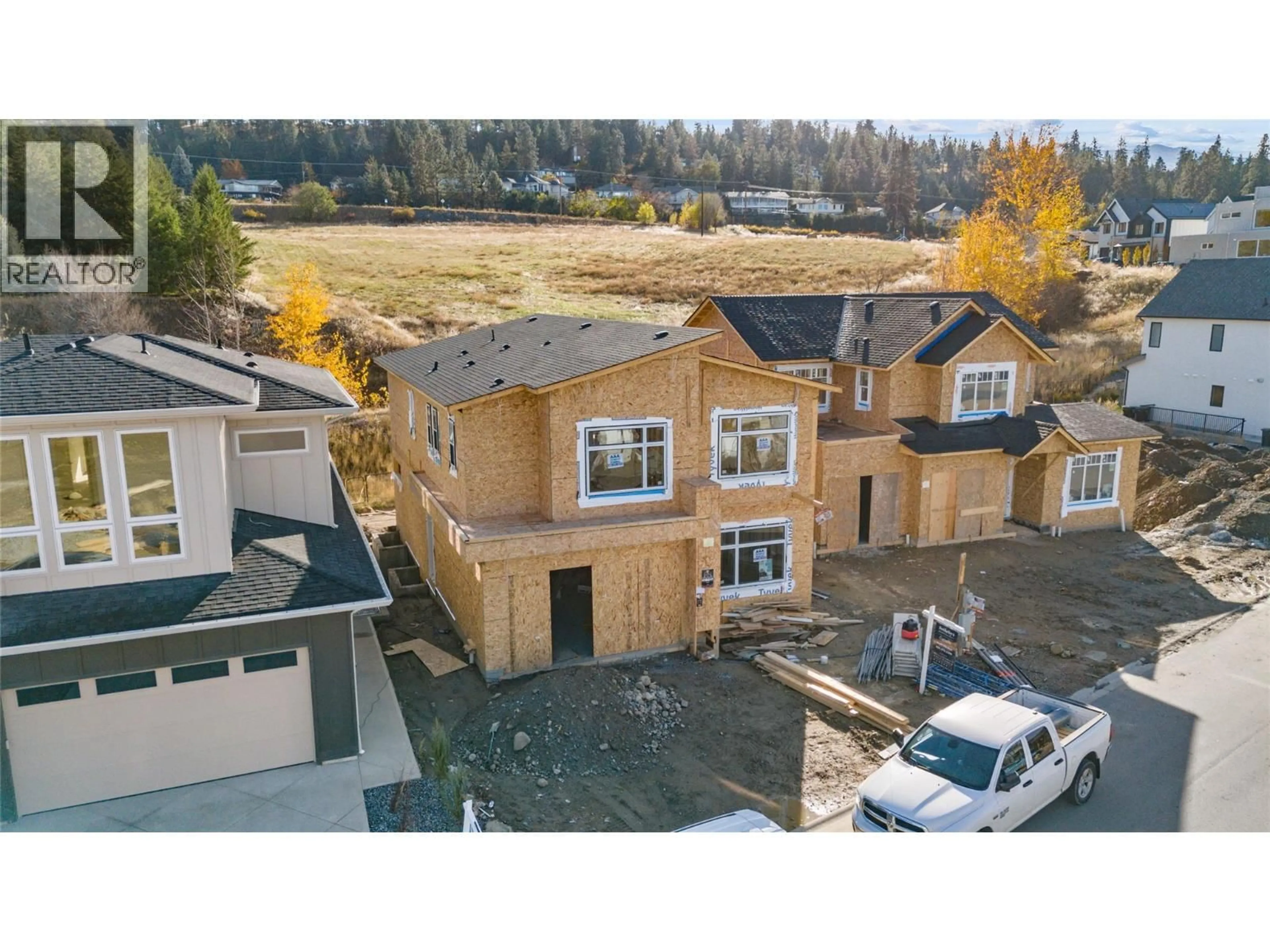 A pic from outside/outdoor area/front of a property/back of a property/a pic from drone, unknown for 1016 BULL CRESCENT, Kelowna British Columbia V1W0B6
