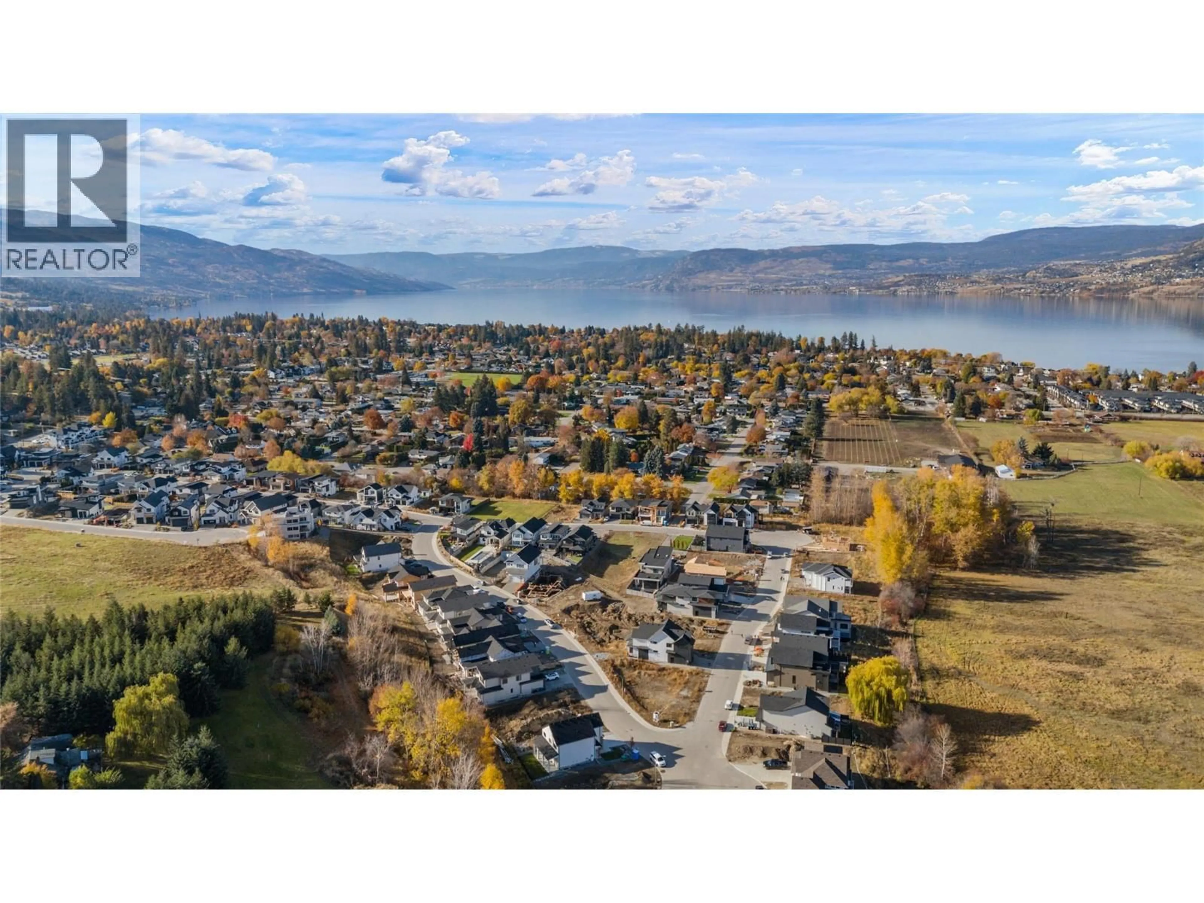 A pic from outside/outdoor area/front of a property/back of a property/a pic from drone, mountain view for 1016 BULL CRESCENT, Kelowna British Columbia V1W0B6