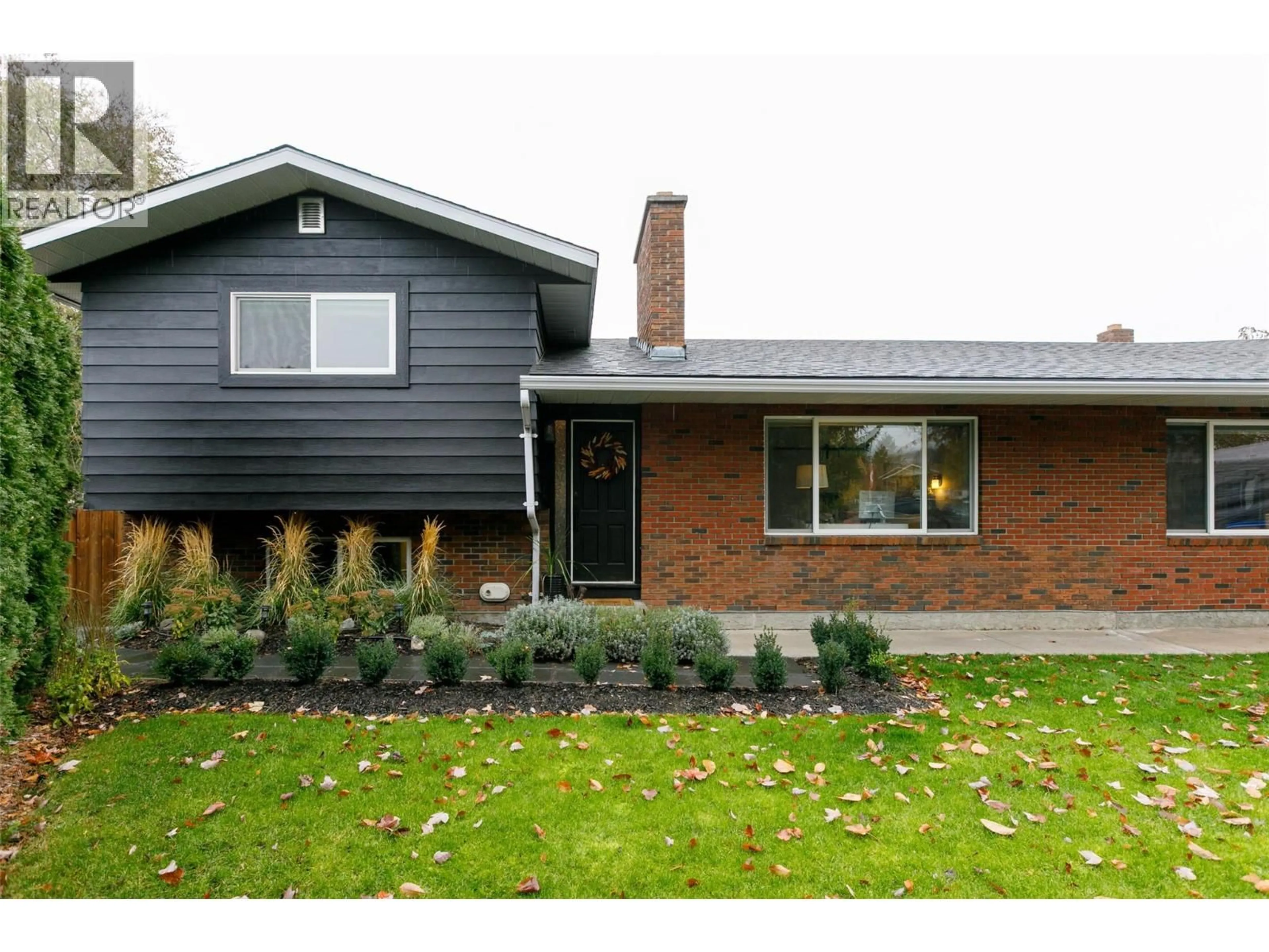 Home with brick exterior material, street for 420 MUGFORD COURT, Kelowna British Columbia V1X5N4
