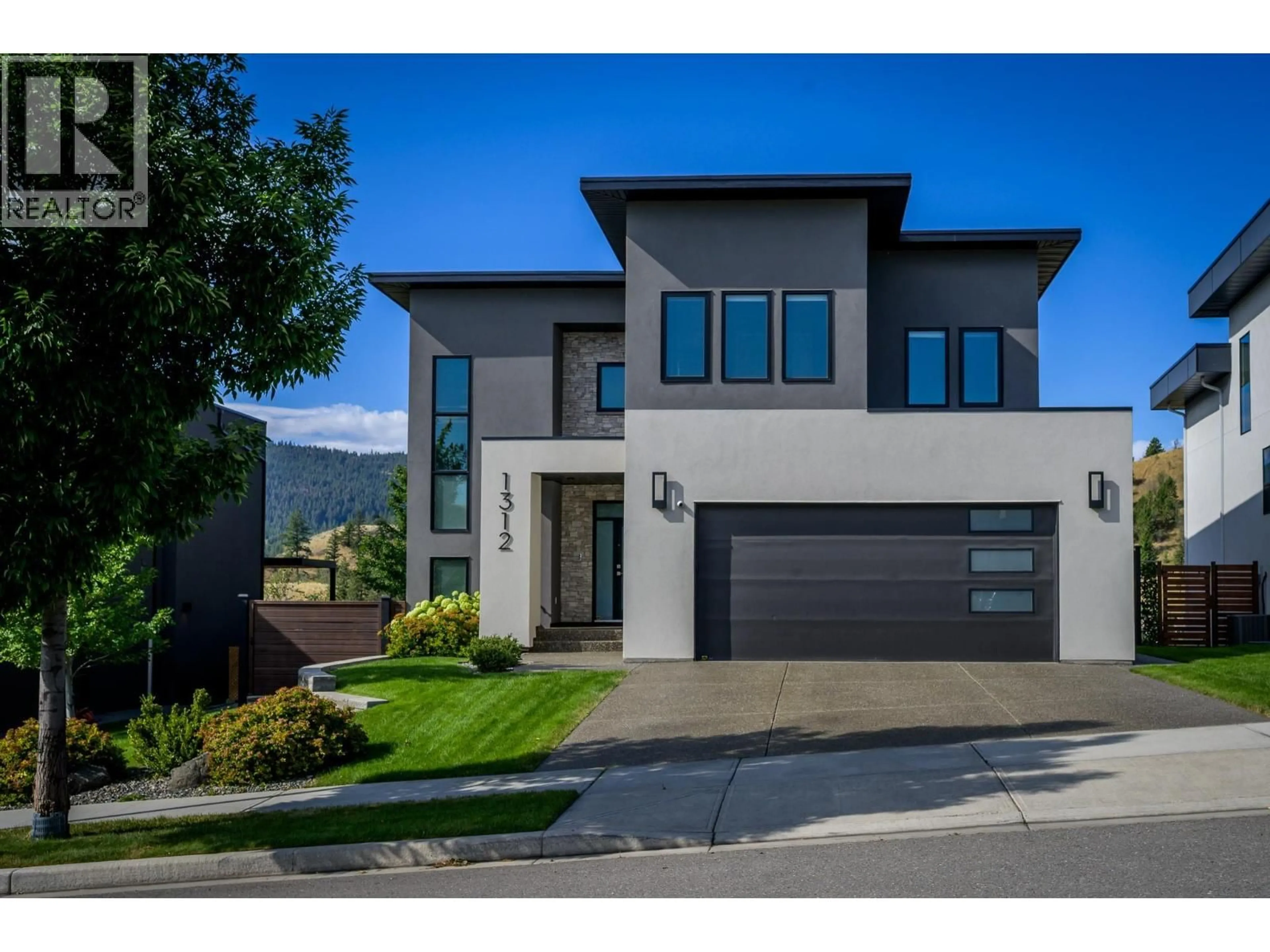 Home with brick exterior material, street for 1312 PRAIRIE ROSE DRIVE, Kamloops British Columbia V2E0C5