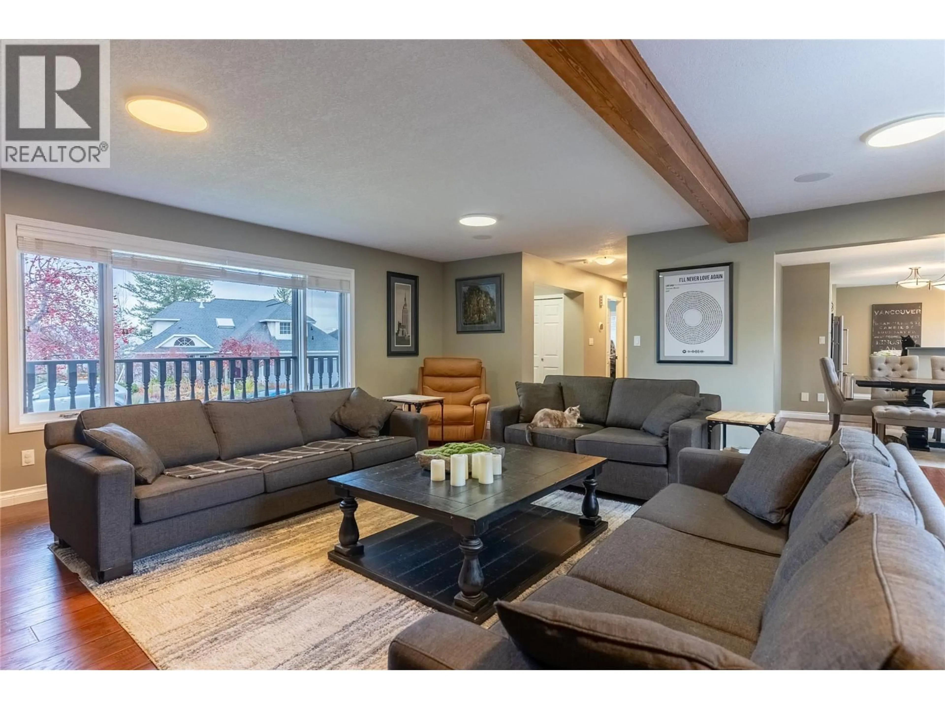 Living room with furniture, wood/laminate floor for 1915 GLEN GARY DRIVE, Kamloops British Columbia V2E1P5