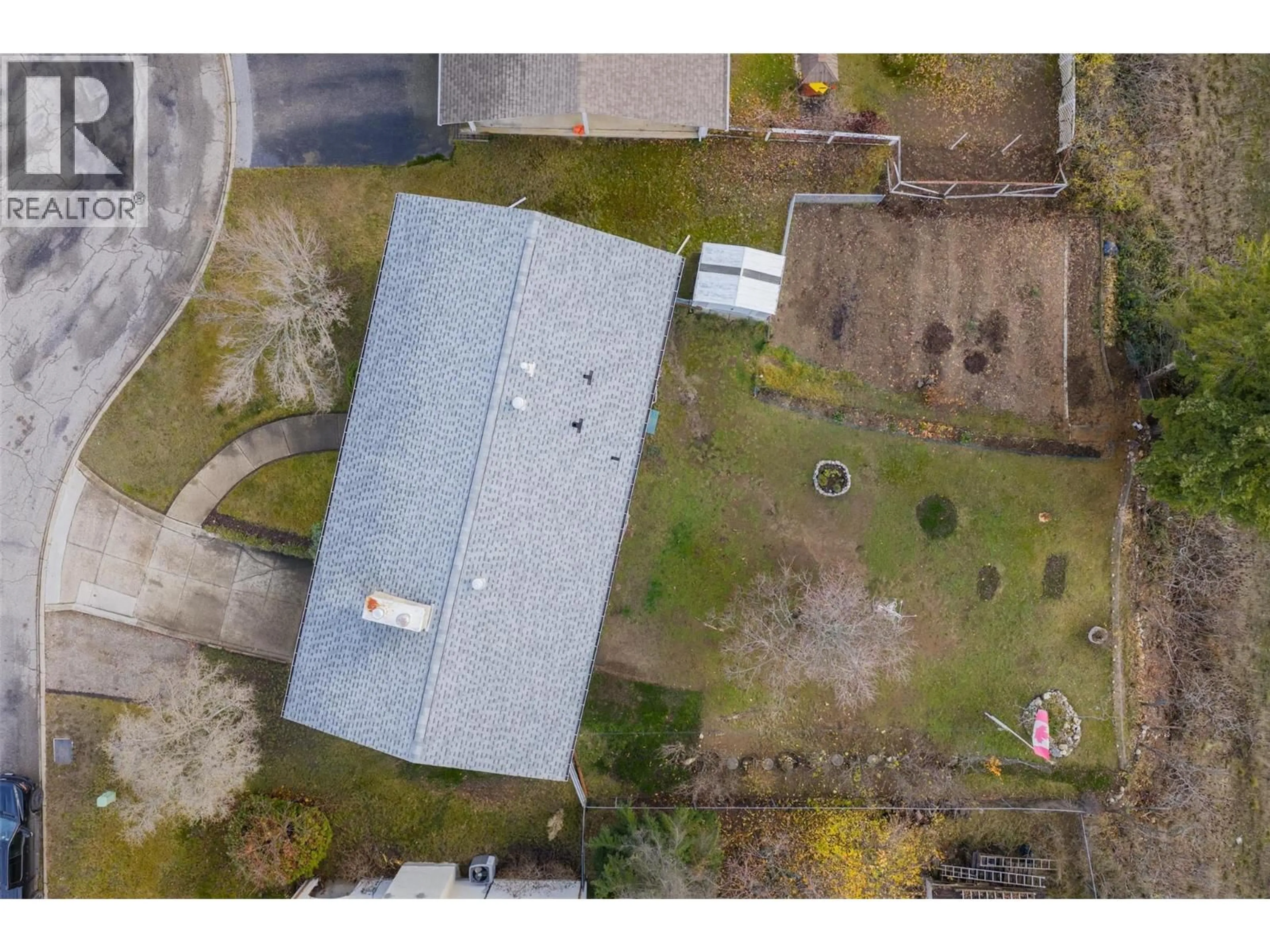 A pic from outside/outdoor area/front of a property/back of a property/a pic from drone, building for 1937 RIVERSIDE CRESCENT, Castlegar British Columbia V1N3W5