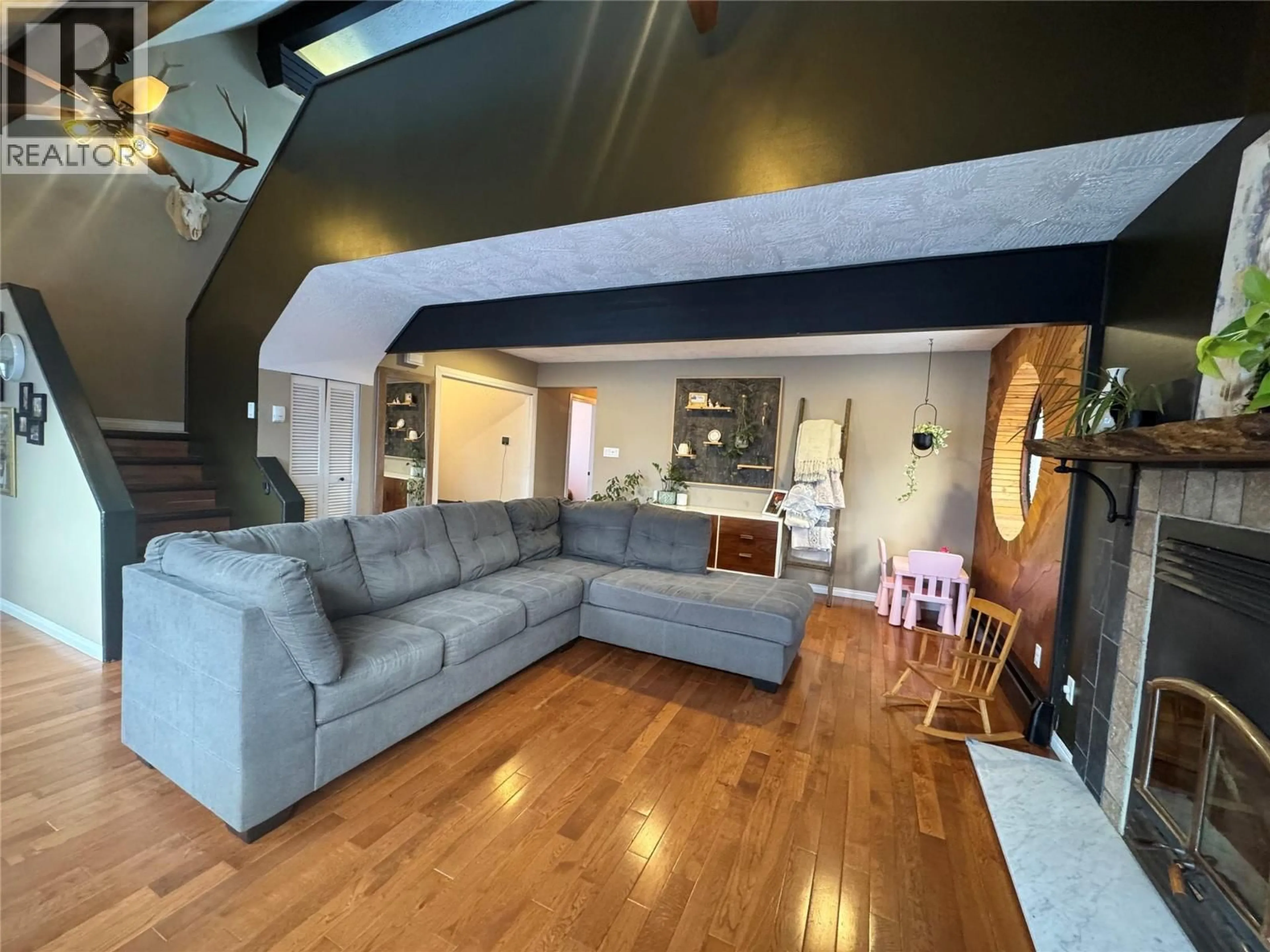 Living room with furniture, unknown for 1605 108 AVENUE, Dawson Creek British Columbia V1G2T5