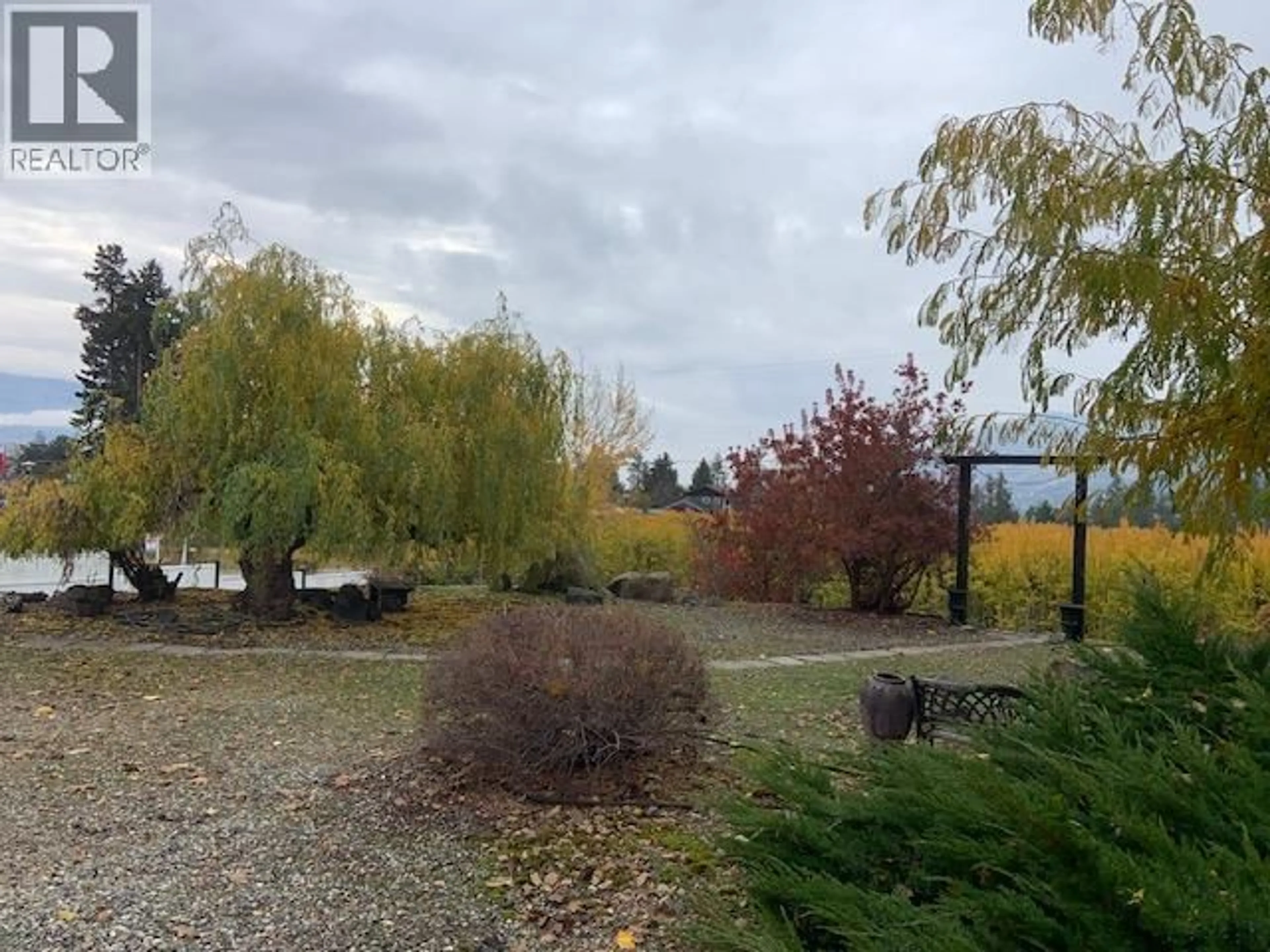 A pic from outside/outdoor area/front of a property/back of a property/a pic from drone, unknown for 5037 ELLIOTT AVENUE, Peachland British Columbia V0H1X8