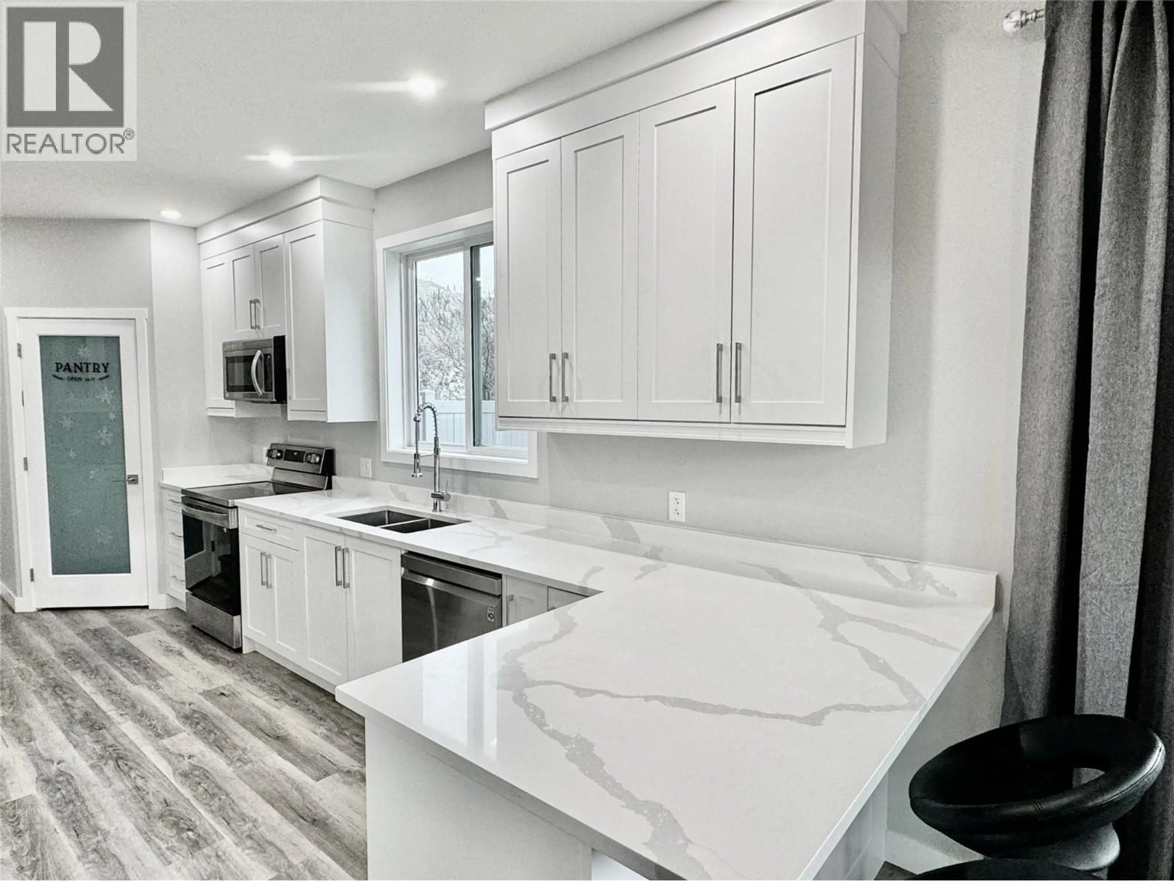 Contemporary kitchen, ceramic/tile floor for 102 - 5830 OKANAGAN STREET, Oliver British Columbia V0H1T9
