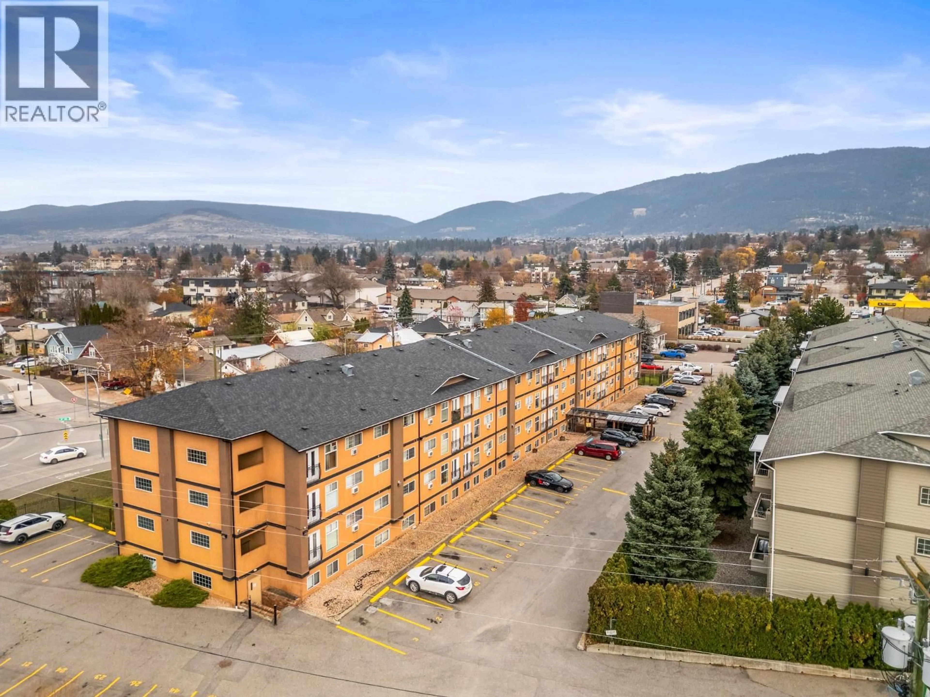 A pic from outside/outdoor area/front of a property/back of a property/a pic from drone, mountain view for 205 - 3800 28A STREET, Vernon British Columbia V1T9K8