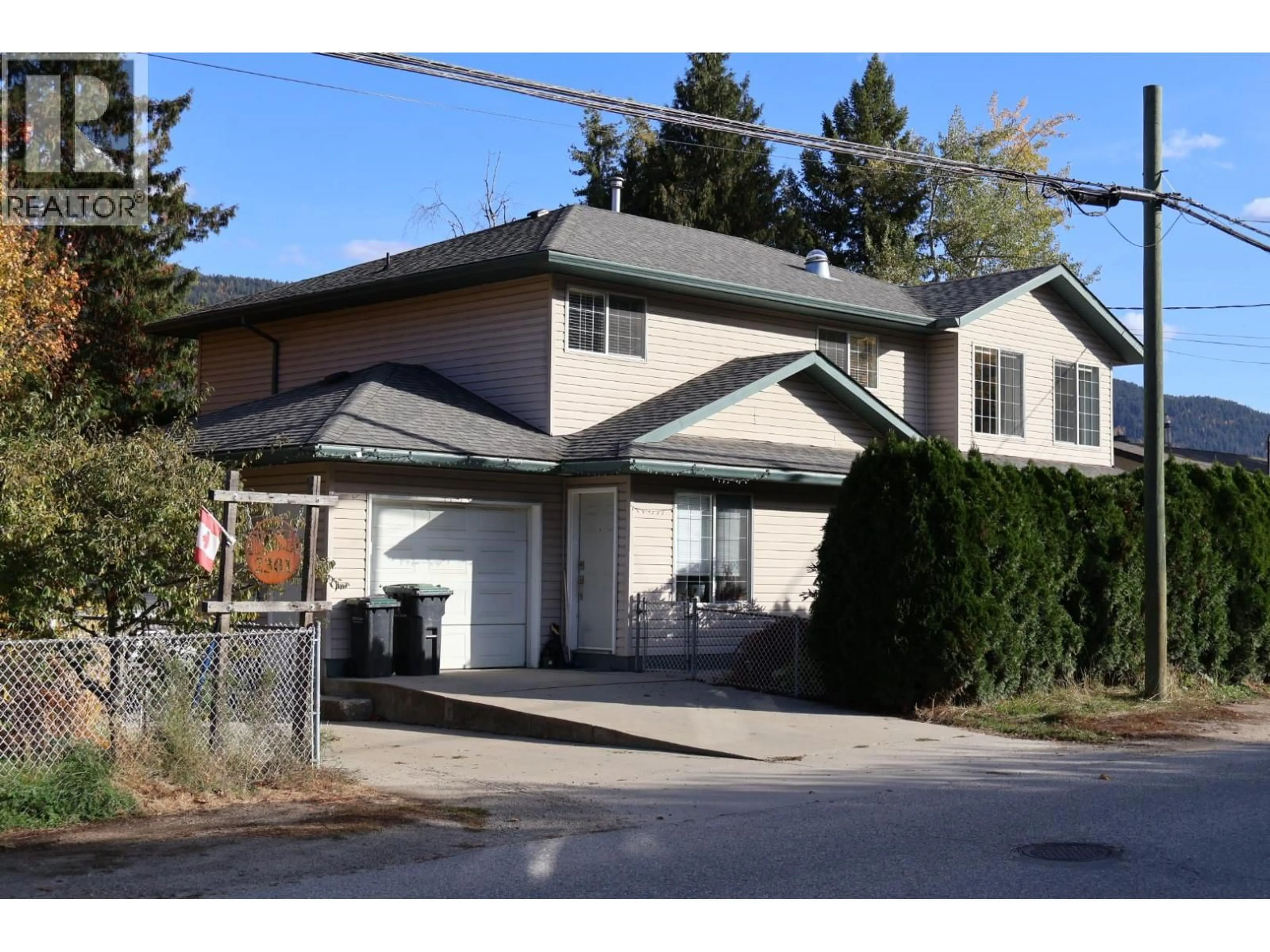 Home with vinyl exterior material, street for 2301 10TH AVENUE, Castlegar British Columbia V1N3A1