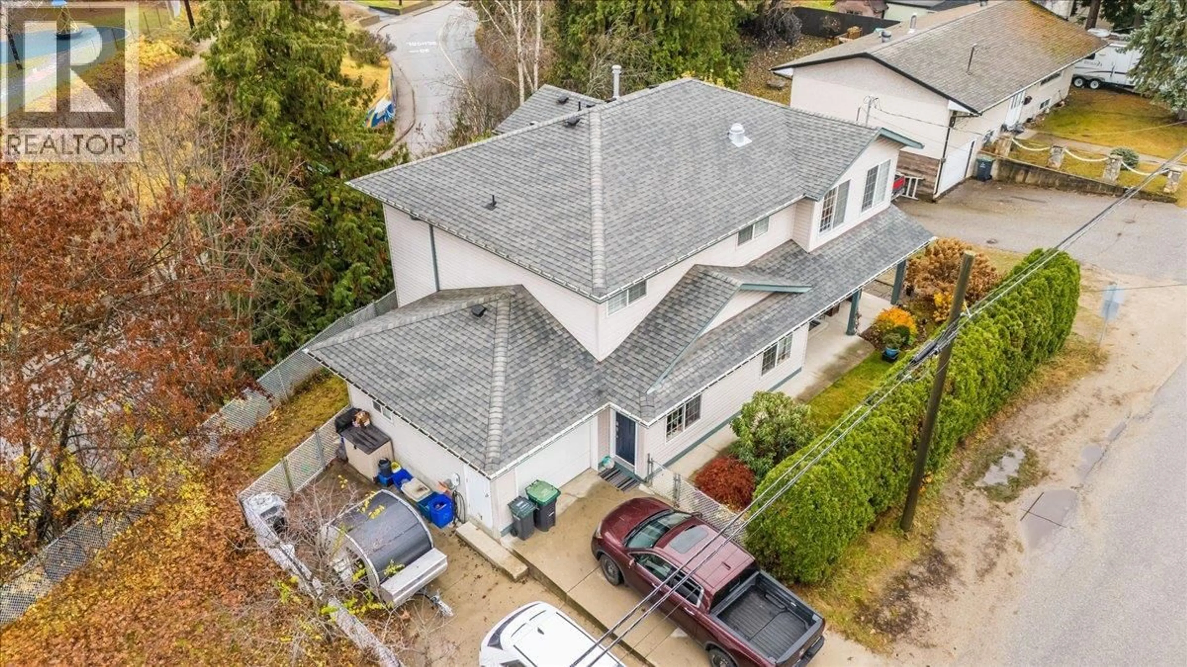 A pic from outside/outdoor area/front of a property/back of a property/a pic from drone, street for 2301 10TH AVENUE, Castlegar British Columbia V1N3A1