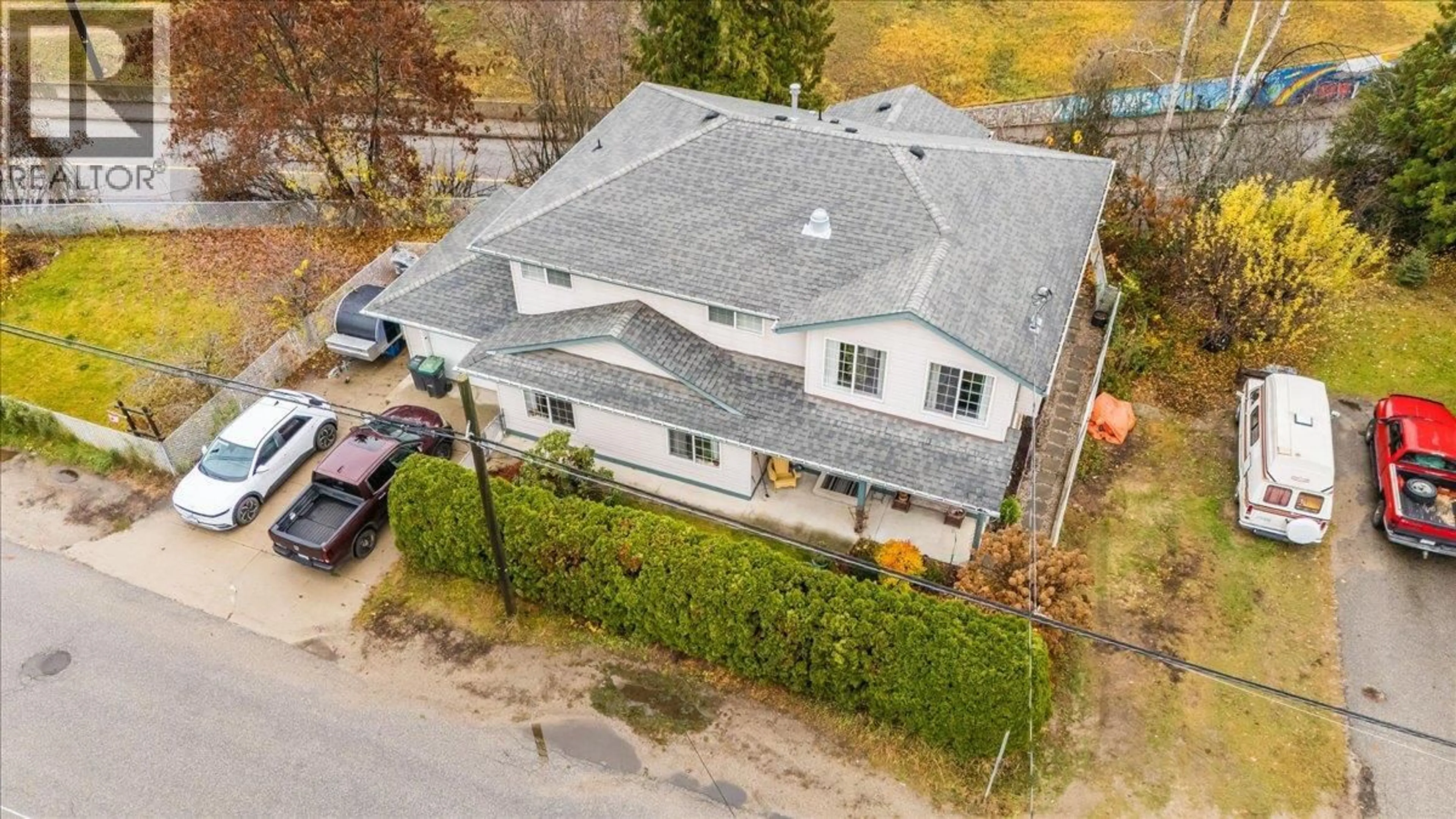 A pic from outside/outdoor area/front of a property/back of a property/a pic from drone, street for 2301 10TH AVENUE, Castlegar British Columbia V1N3A1