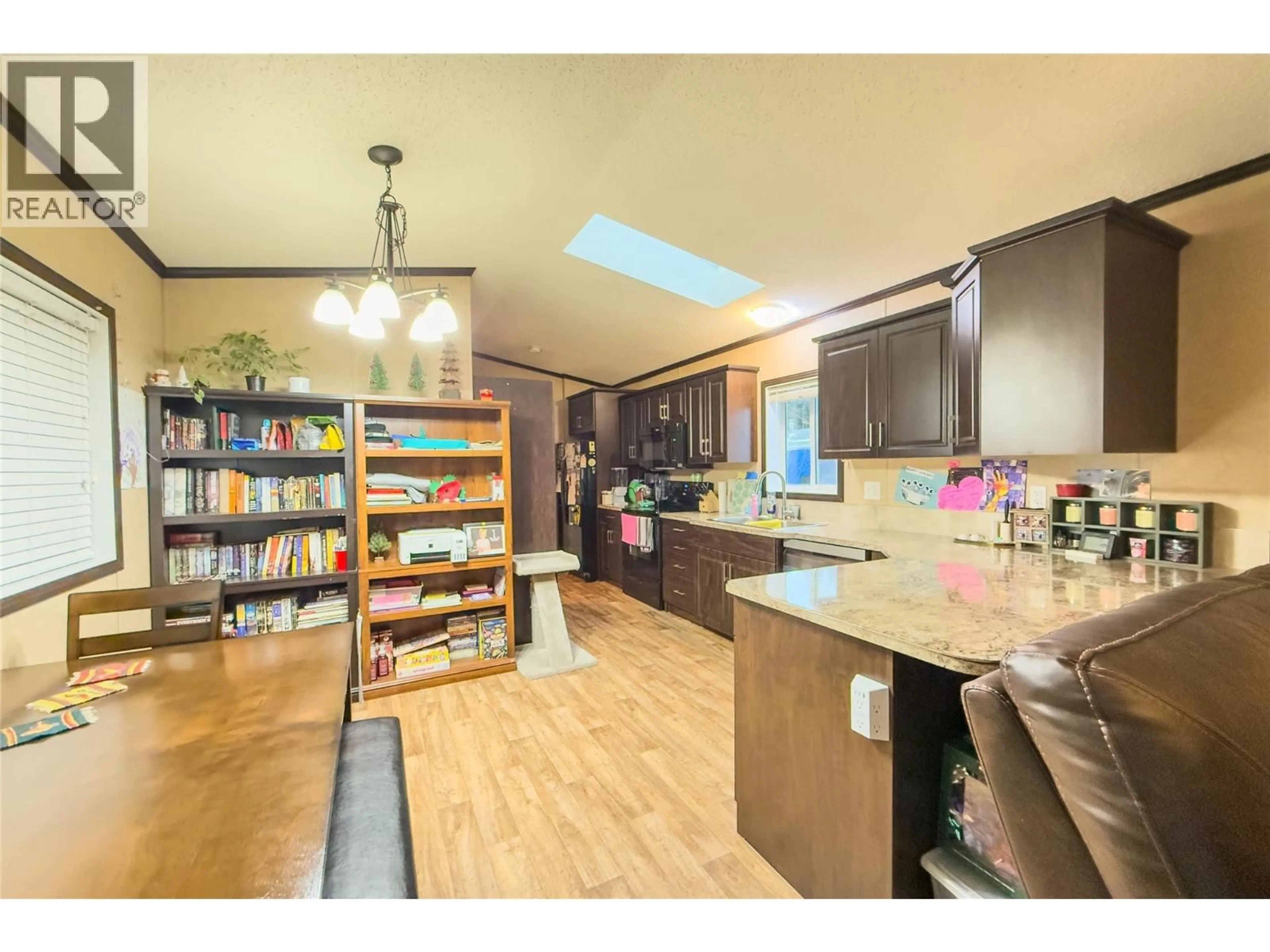 Open concept kitchen, wood/laminate floor for 1400 12TH STREET, Golden British Columbia V0A1H1