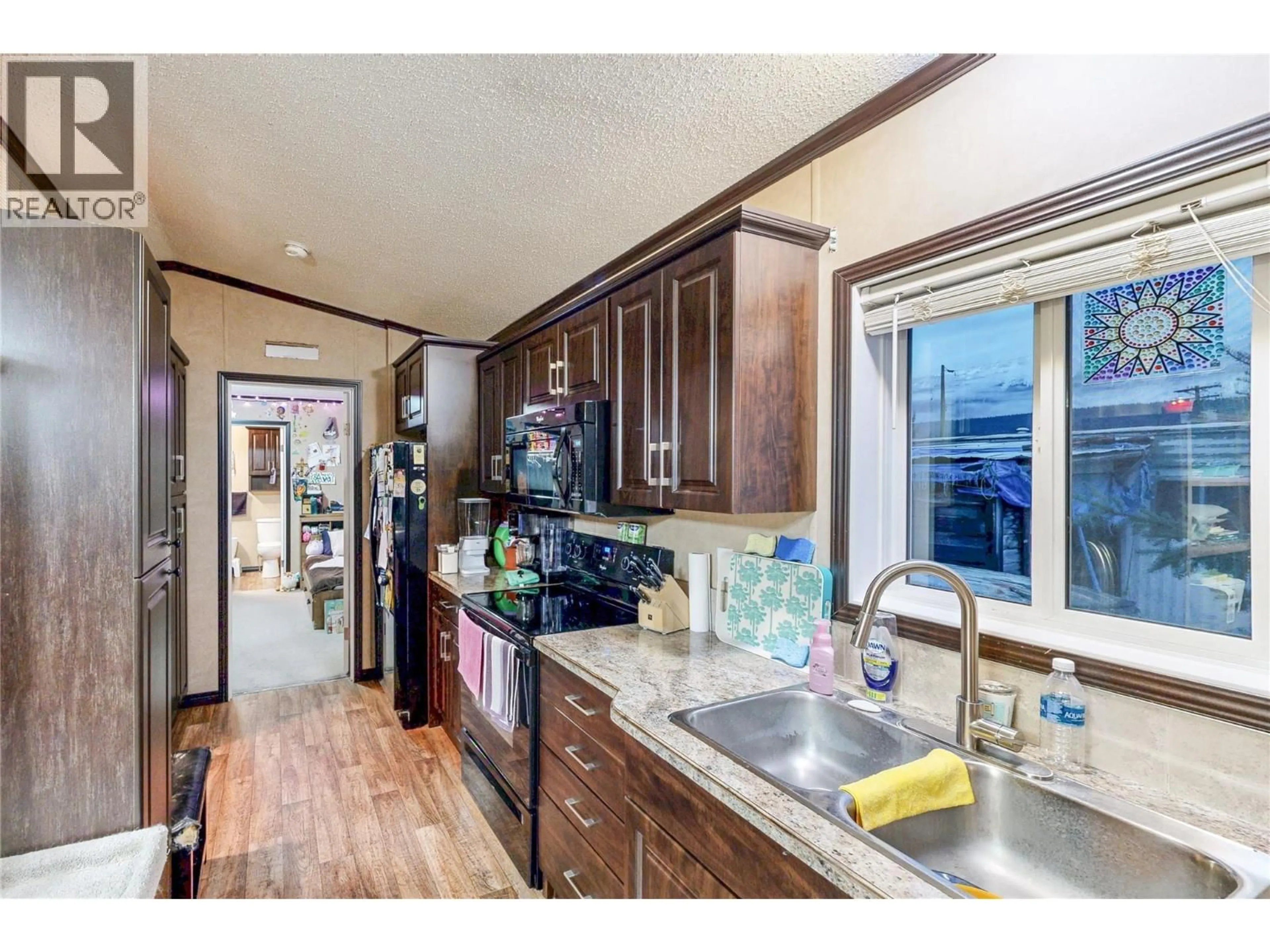 Open concept kitchen, unknown for 1400 12TH STREET, Golden British Columbia V0A1H1