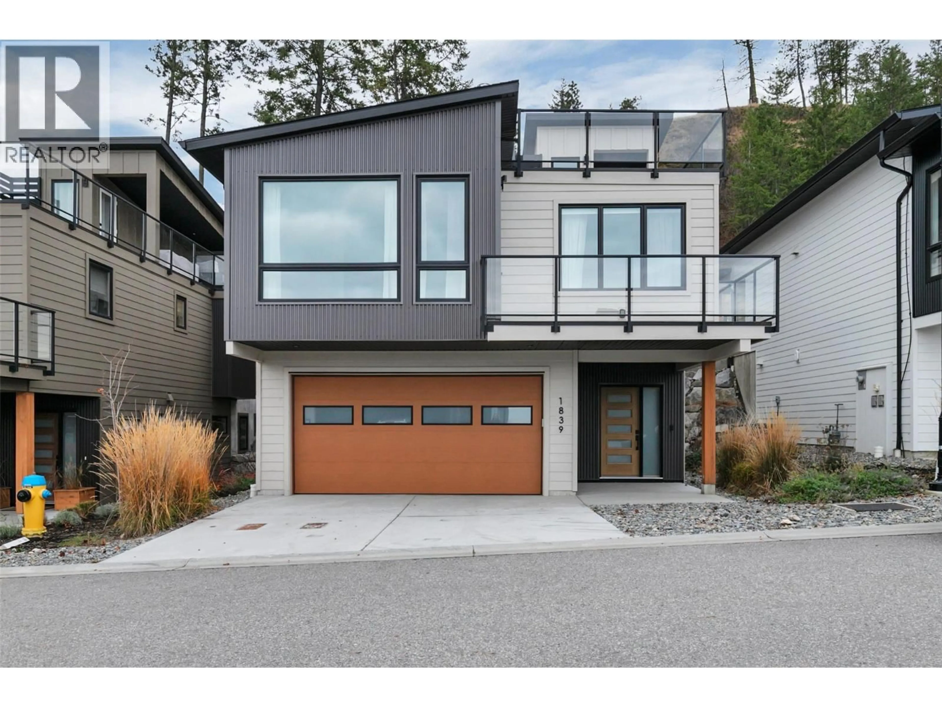 Home with brick exterior material, street for 1839 GREY OWL COURT, Kelowna British Columbia V1V0C6