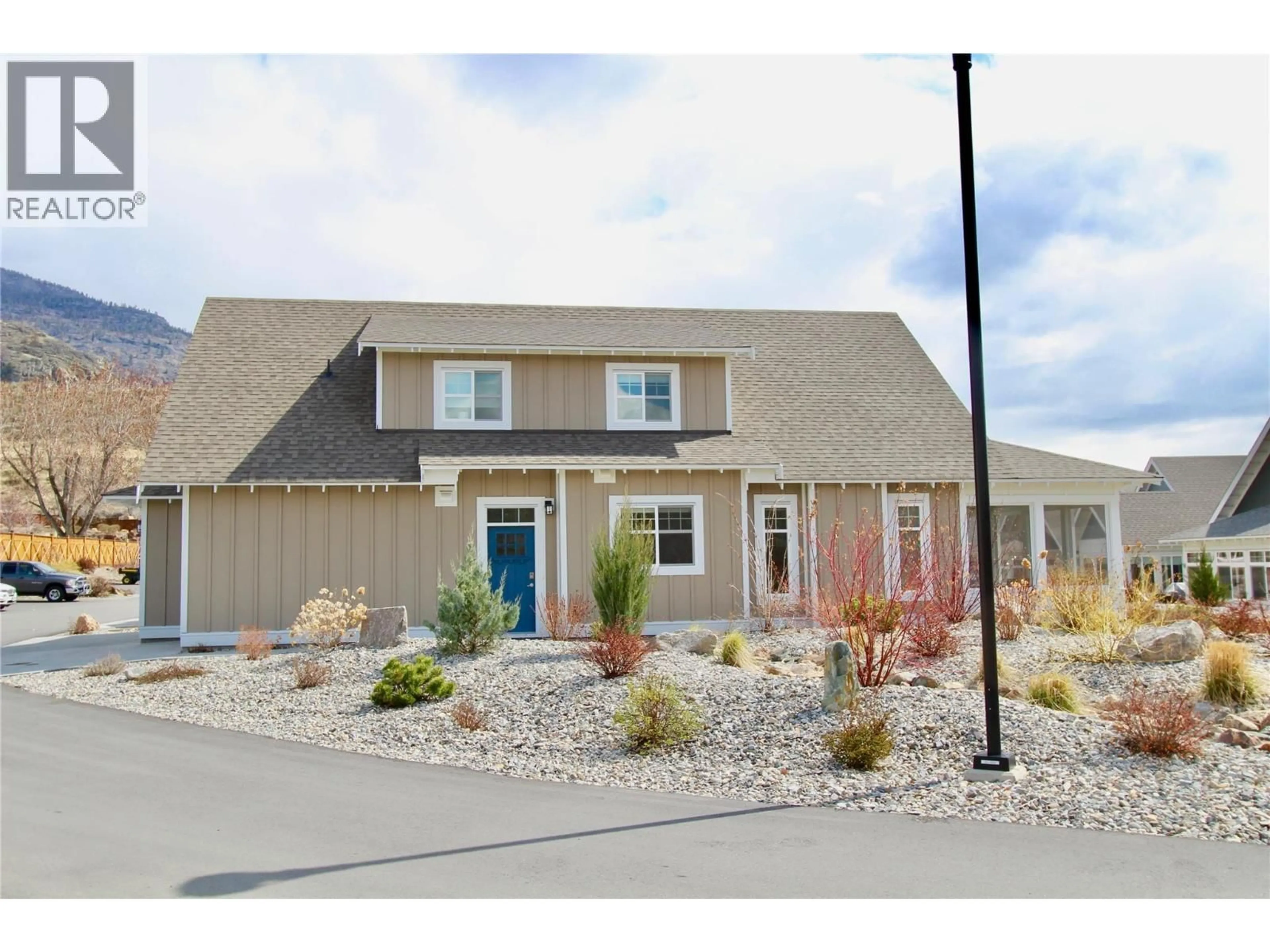 Home with vinyl exterior material, street for 4 - 2450 RADIO TOWER ROAD, Oliver British Columbia V0H1T1