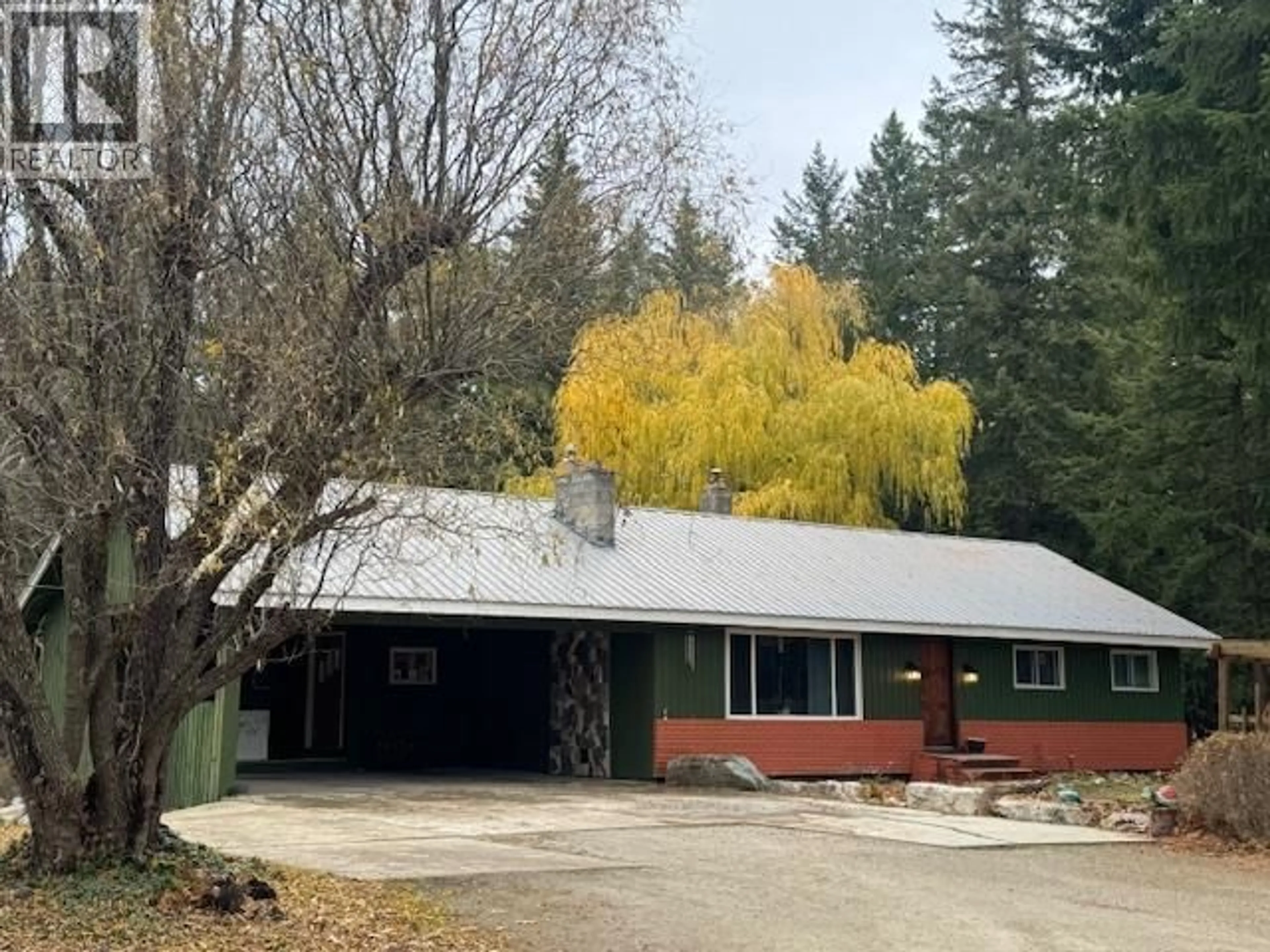 A pic from outside/outdoor area/front of a property/back of a property/a pic from drone, street for 1059 TAPPEN VALLEY ROAD, Tappen British Columbia V0E2X3
