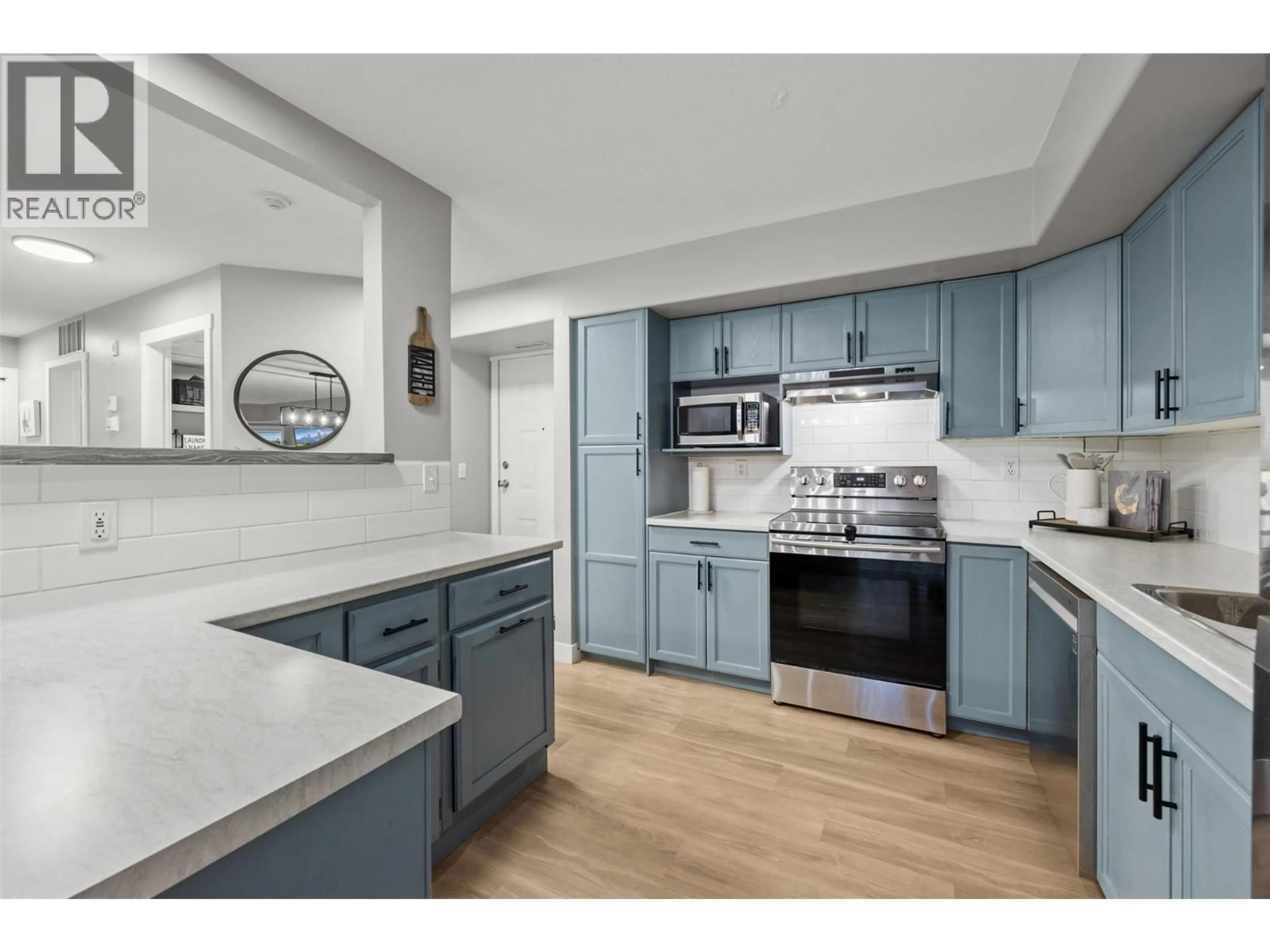 Open concept kitchen, unknown for 310 - 3115 DE MONTREUIL COURT, Kelowna British Columbia V1W3W1