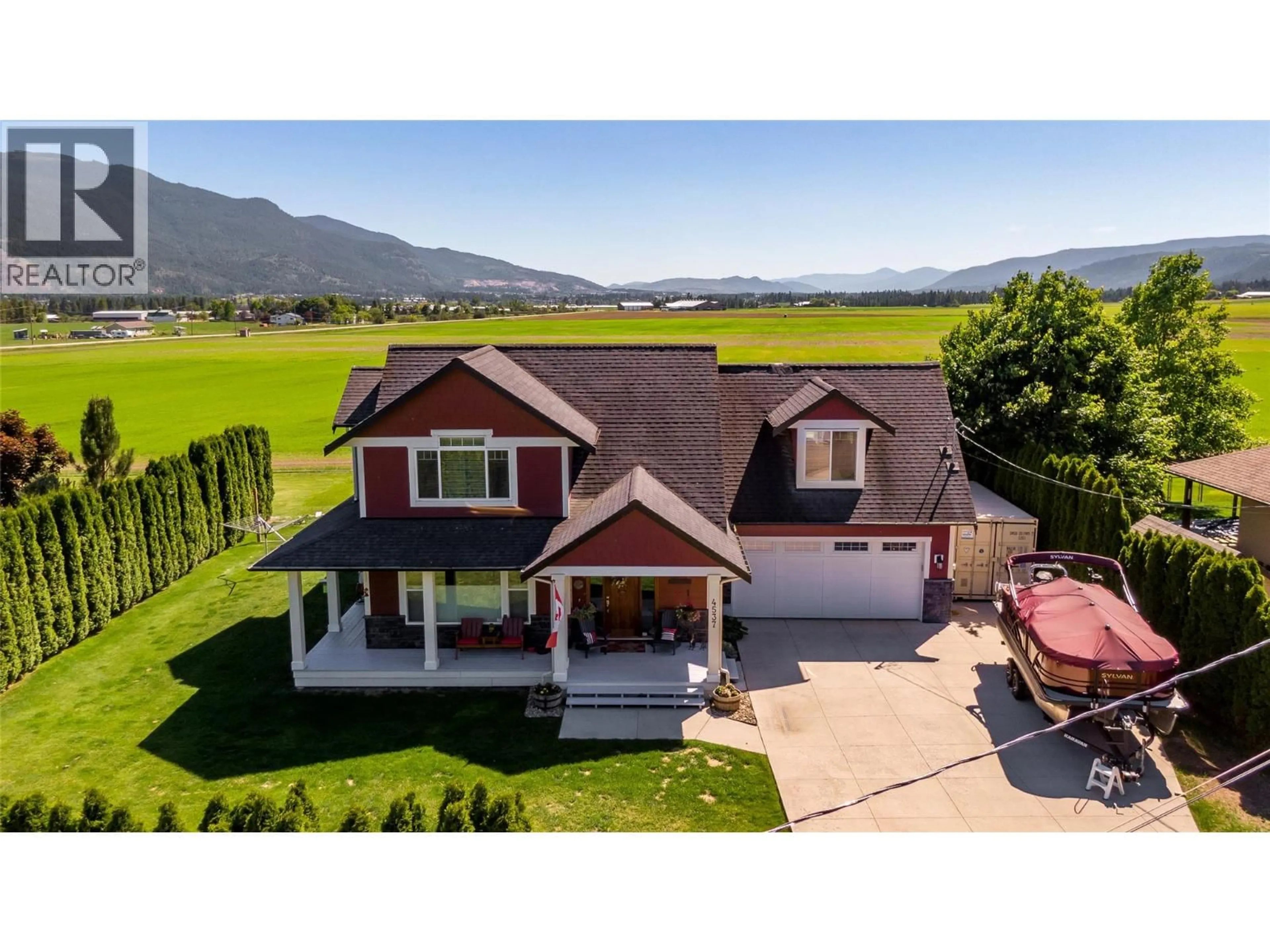 A pic from outside/outdoor area/front of a property/back of a property/a pic from drone, mountain view for 4537 LANSDOWNE ROAD, Armstrong British Columbia V0E1B8