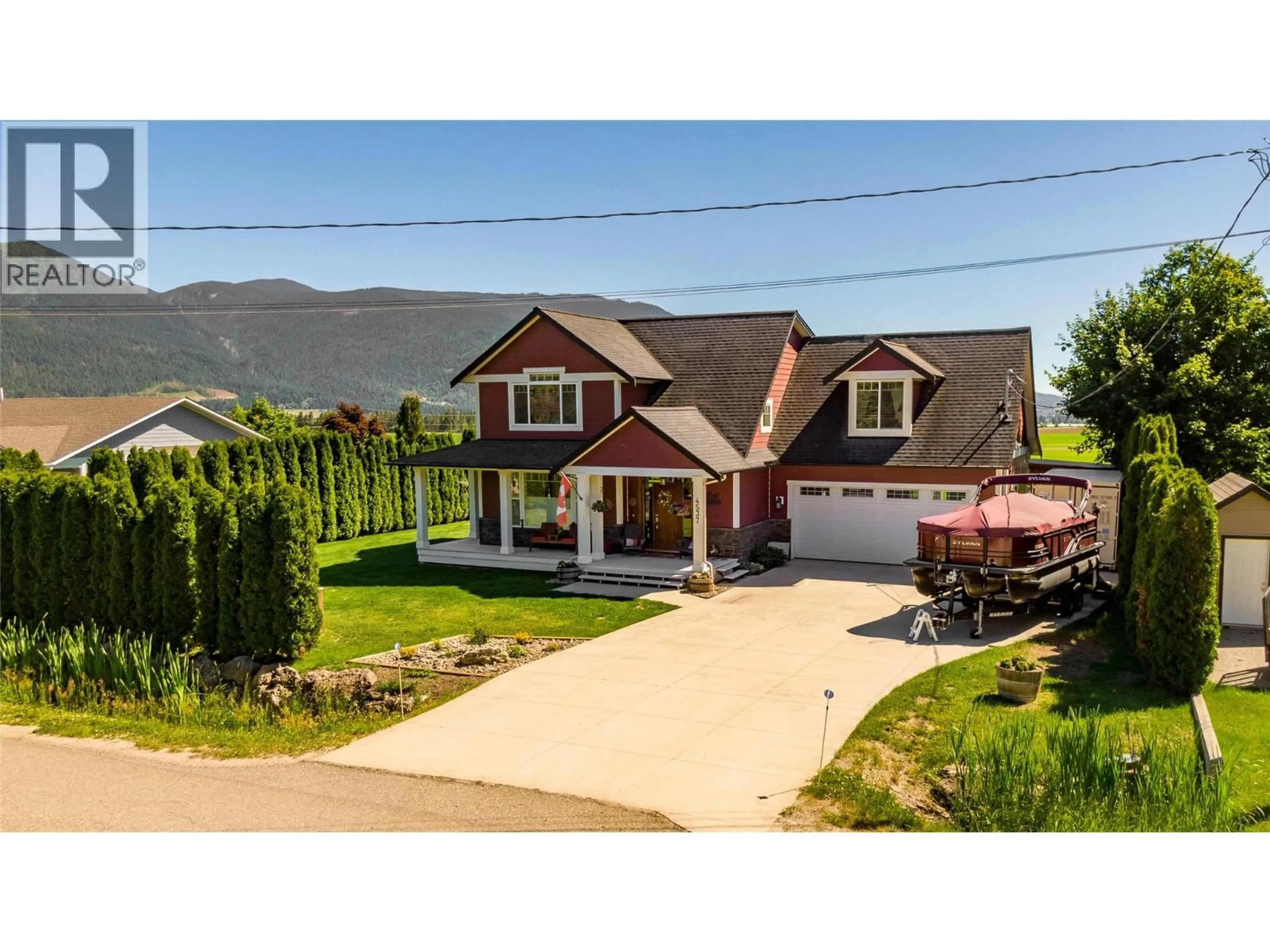 A pic from outside/outdoor area/front of a property/back of a property/a pic from drone, mountain view for 4537 LANSDOWNE ROAD, Armstrong British Columbia V0E1B8