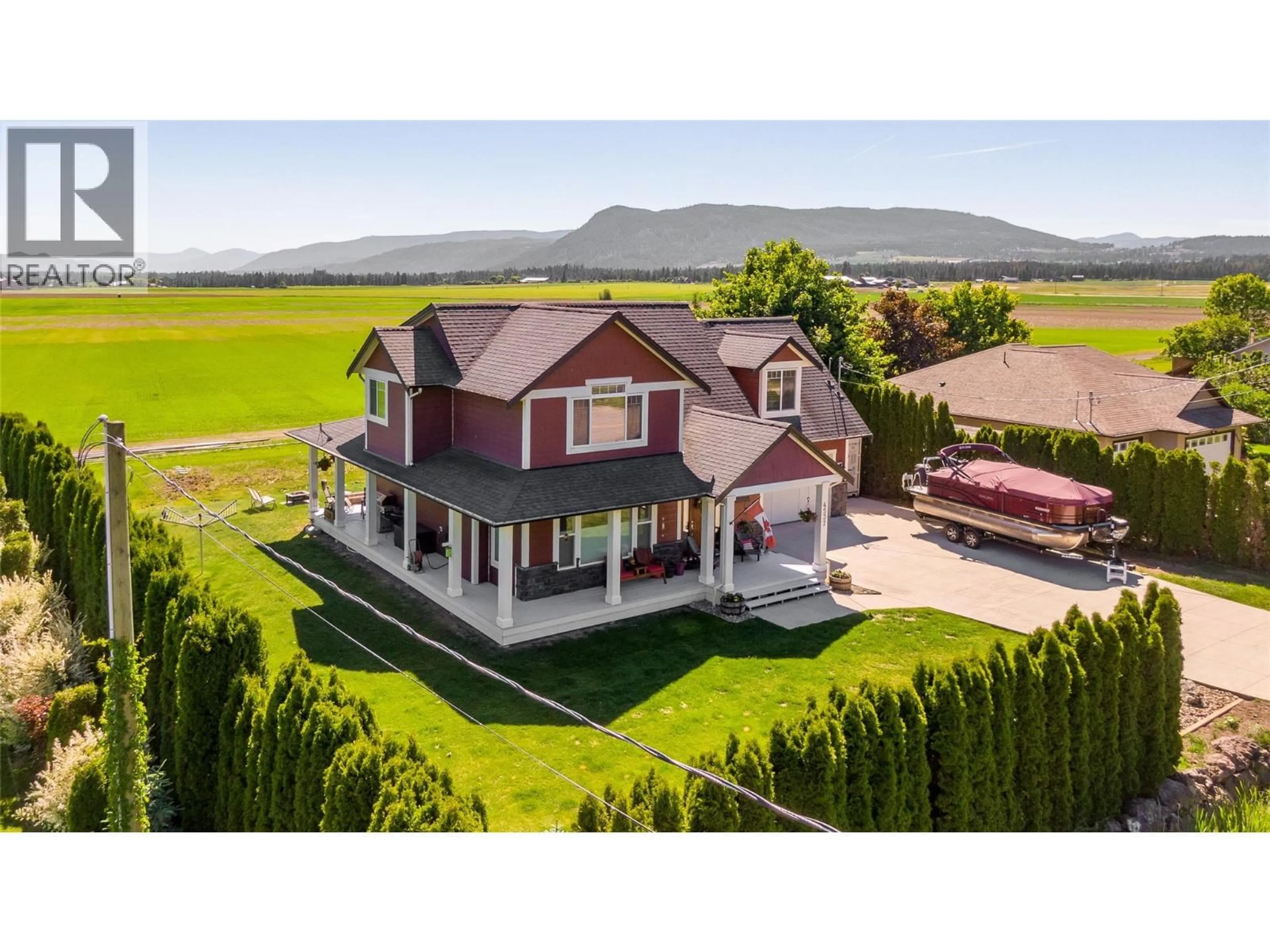 A pic from outside/outdoor area/front of a property/back of a property/a pic from drone, mountain view for 4537 LANSDOWNE ROAD, Armstrong British Columbia V0E1B8
