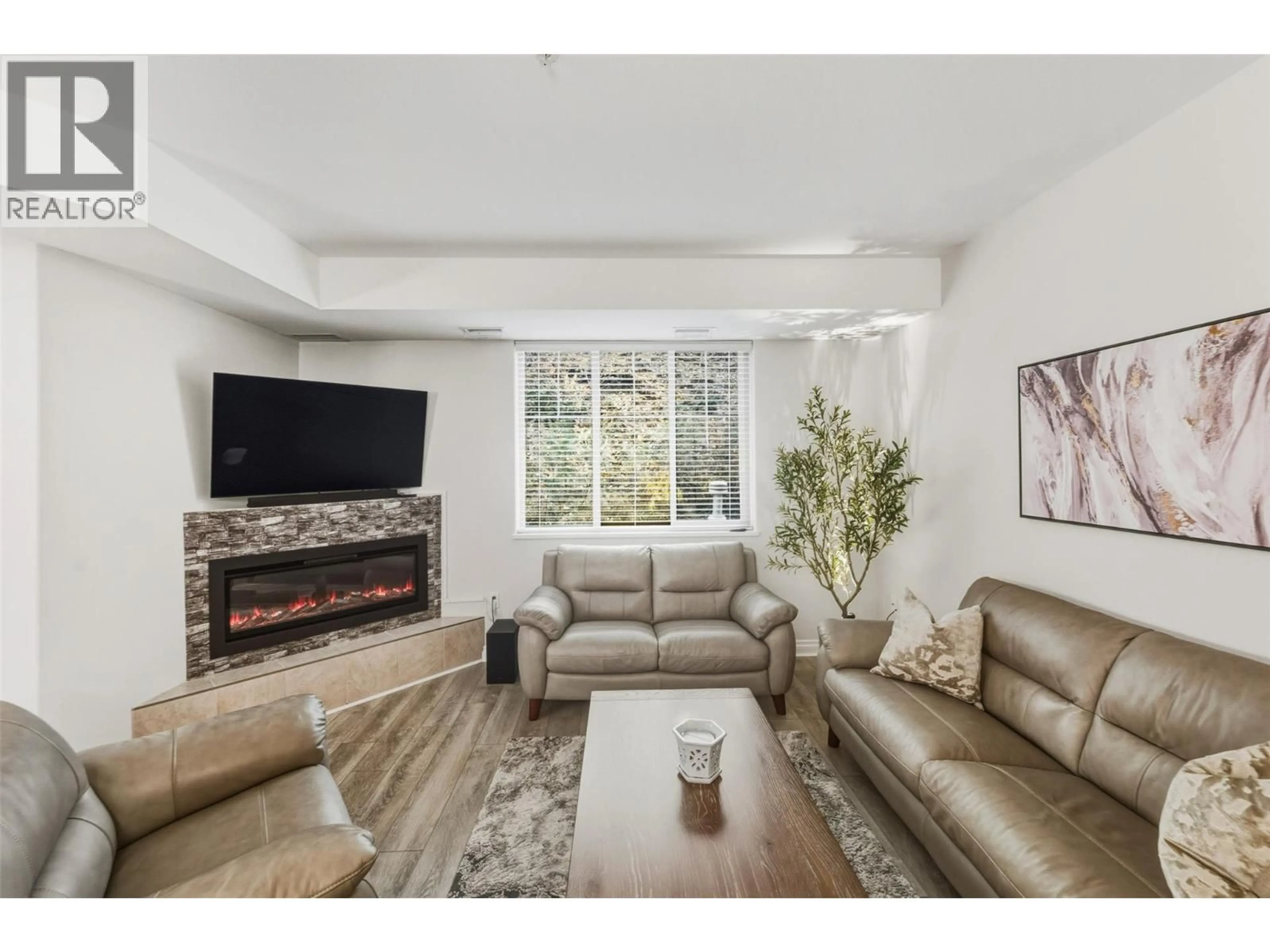 Living room with furniture, unknown for 102B - 921 SPILLWAY ROAD, Oliver British Columbia V0H1T8