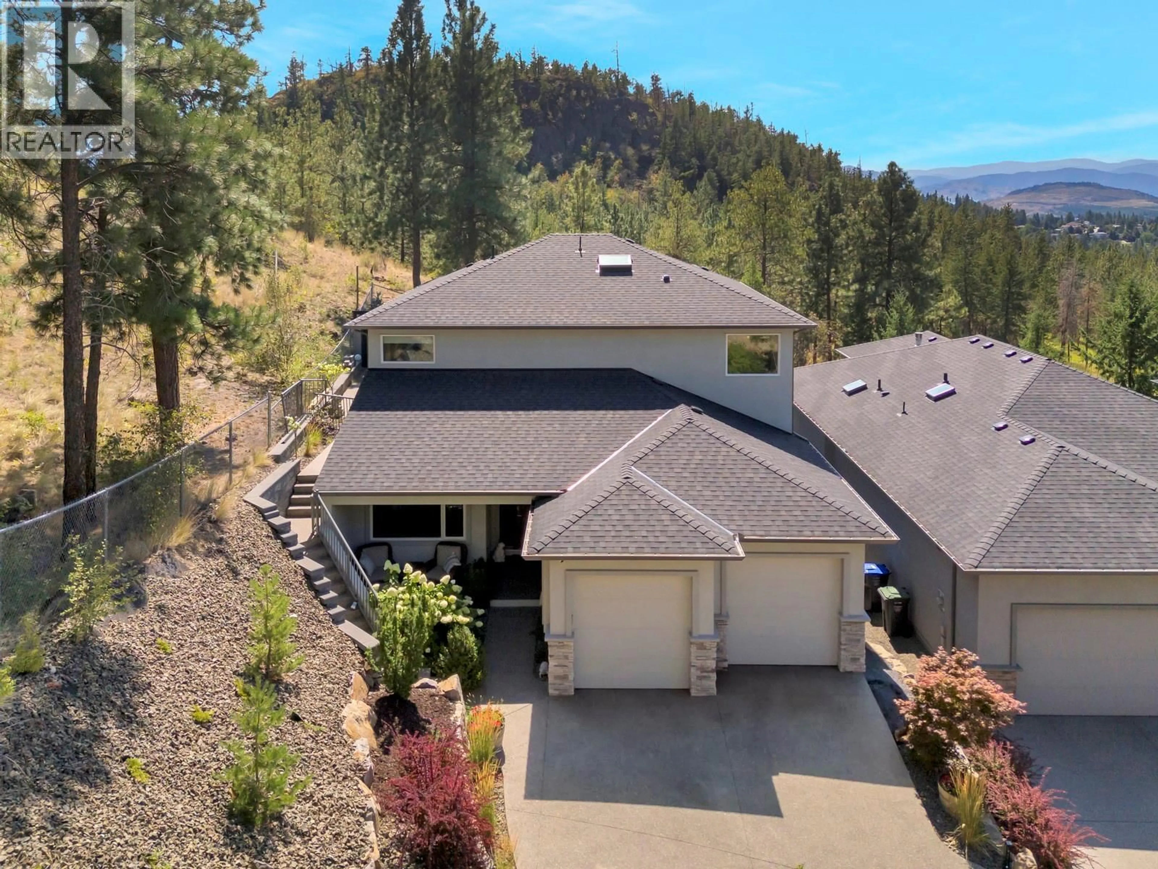 A pic from outside/outdoor area/front of a property/back of a property/a pic from drone, mountain view for 2112 CORNERSTONE DRIVE, West Kelowna British Columbia V4T2Y3
