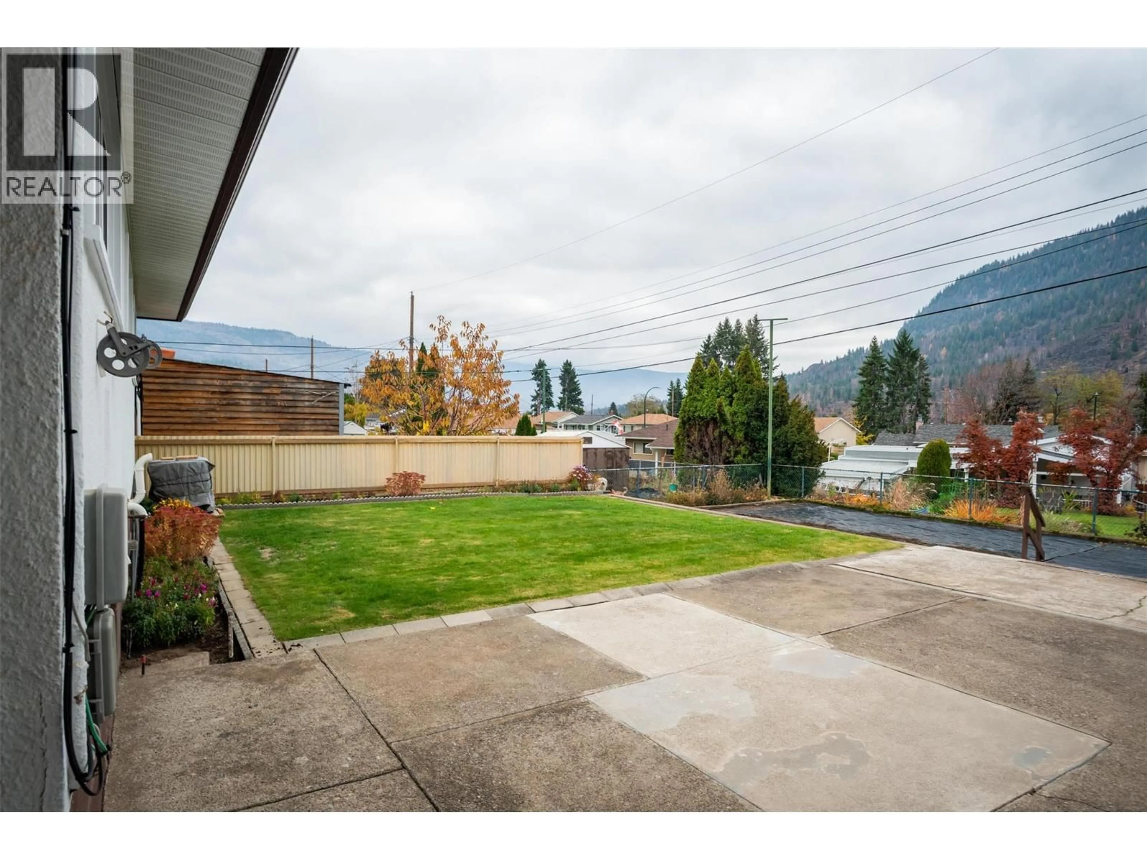 A pic from outside/outdoor area/front of a property/back of a property/a pic from drone, mountain view for 3410 ASTER DRIVE, Trail British Columbia V1R2X3