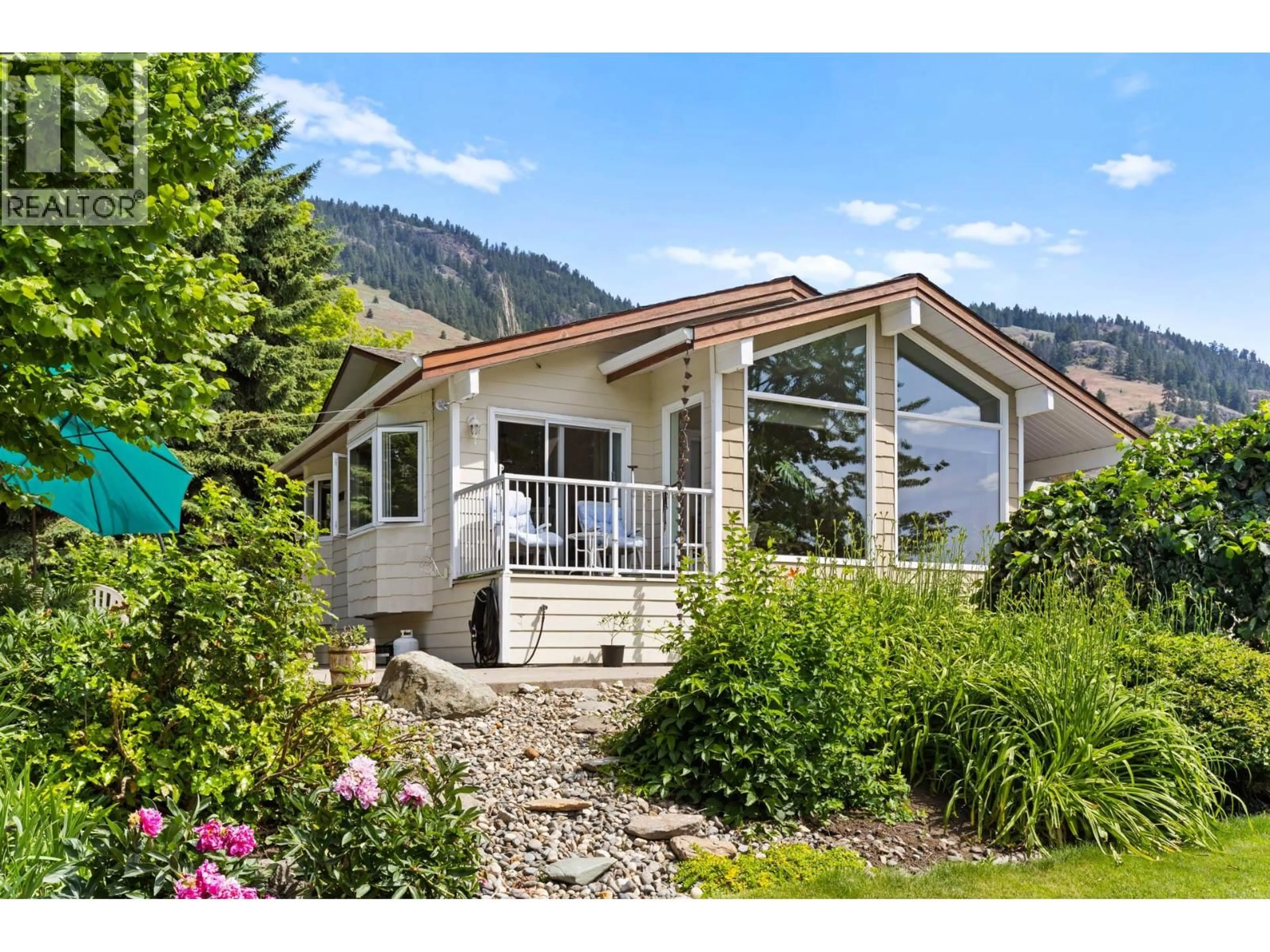 Home with vinyl exterior material, mountain view for 6651 BUCHANAN ROAD, Coldstream British Columbia V1B3C6