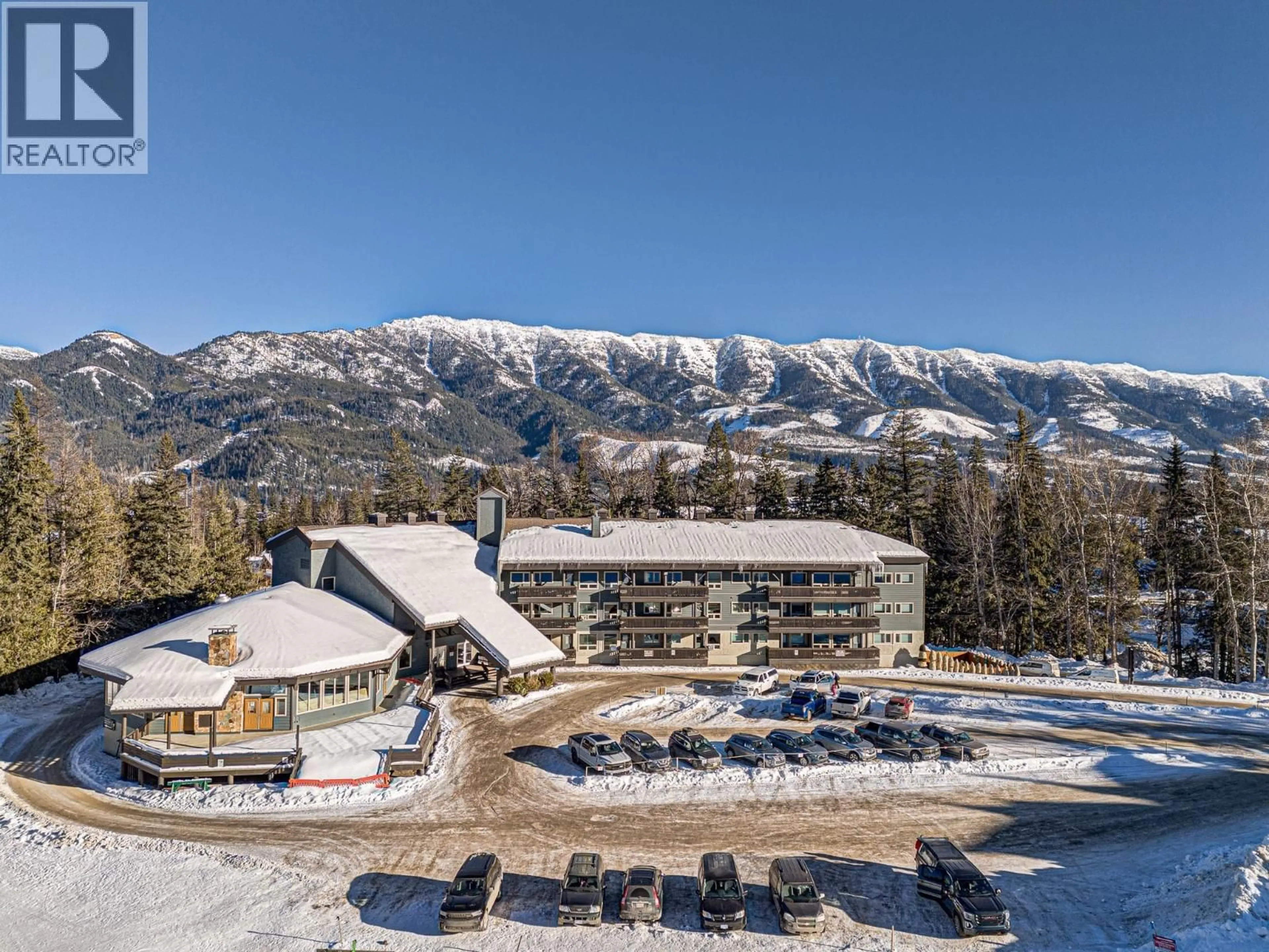 A pic from outside/outdoor area/front of a property/back of a property/a pic from drone, mountain view for 108 - 5369 FERNIE SKI HILL ROAD, Fernie British Columbia V0B1M6