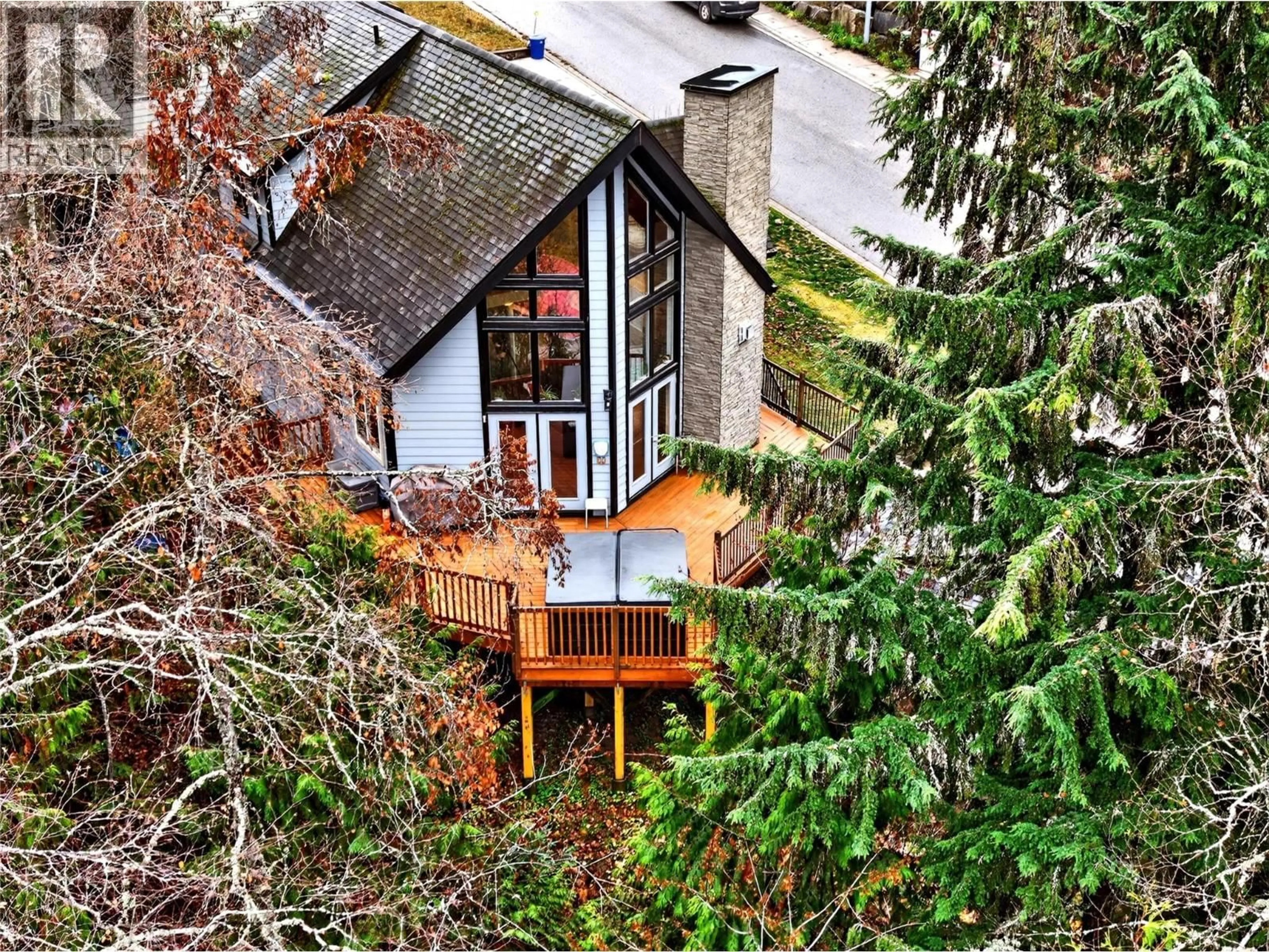 A pic from outside/outdoor area/front of a property/back of a property/a pic from drone, forest/trees view for 2401 PERRIER LANE, Nelson British Columbia V1L7C3