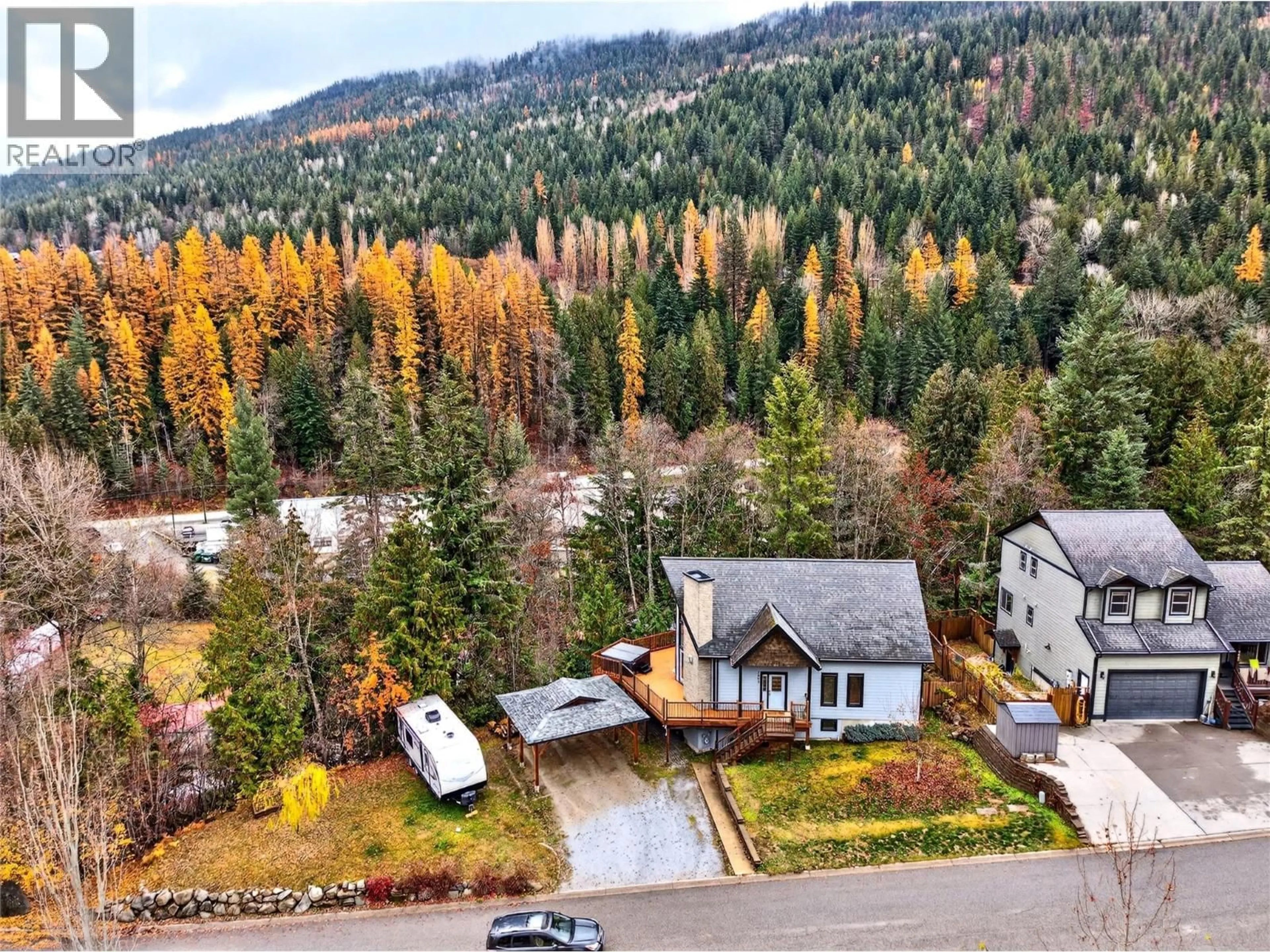 A pic from outside/outdoor area/front of a property/back of a property/a pic from drone, forest/trees view for 2401 PERRIER LANE, Nelson British Columbia V1L7C3