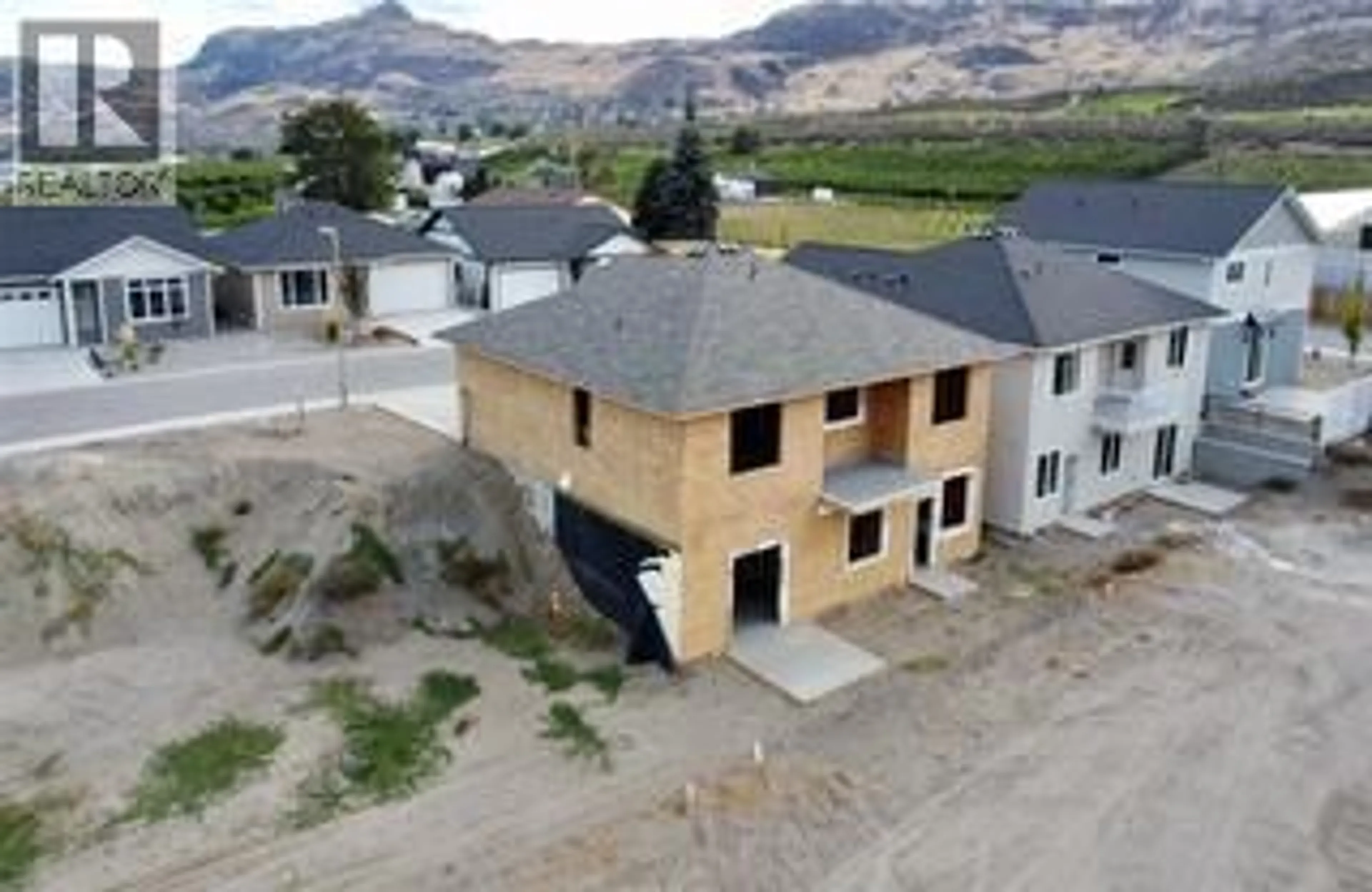 A pic from outside/outdoor area/front of a property/back of a property/a pic from drone, mountain view for 8 WOOD DUCK WAY, Osoyoos British Columbia V0H1V5