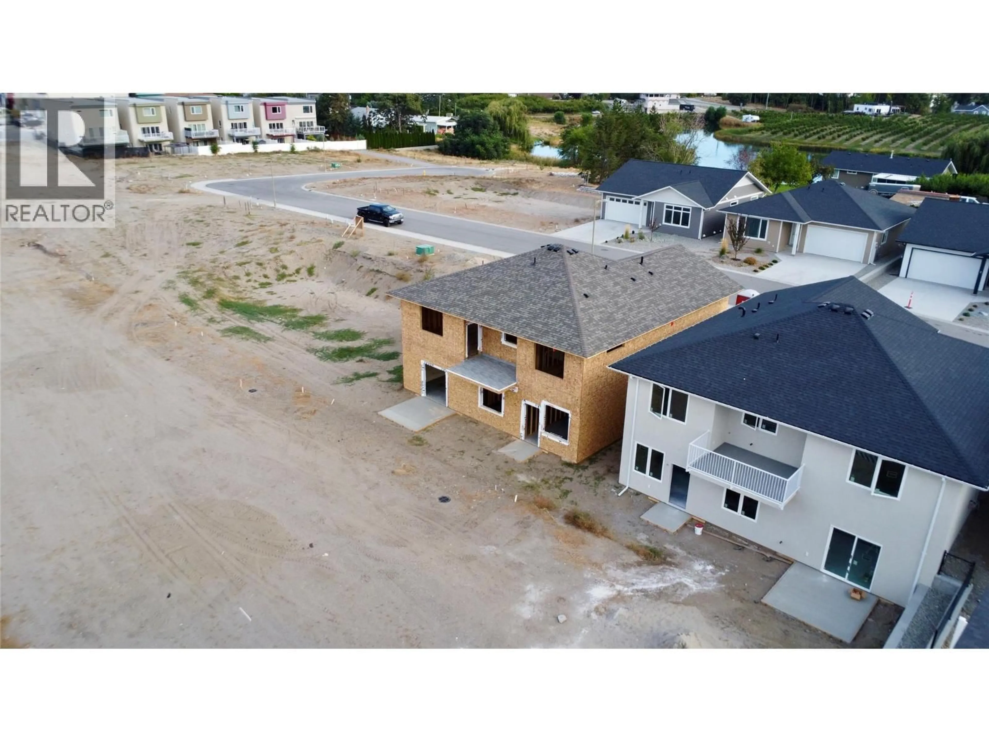 A pic from outside/outdoor area/front of a property/back of a property/a pic from drone, building for 8 WOOD DUCK WAY, Osoyoos British Columbia V0H1V5