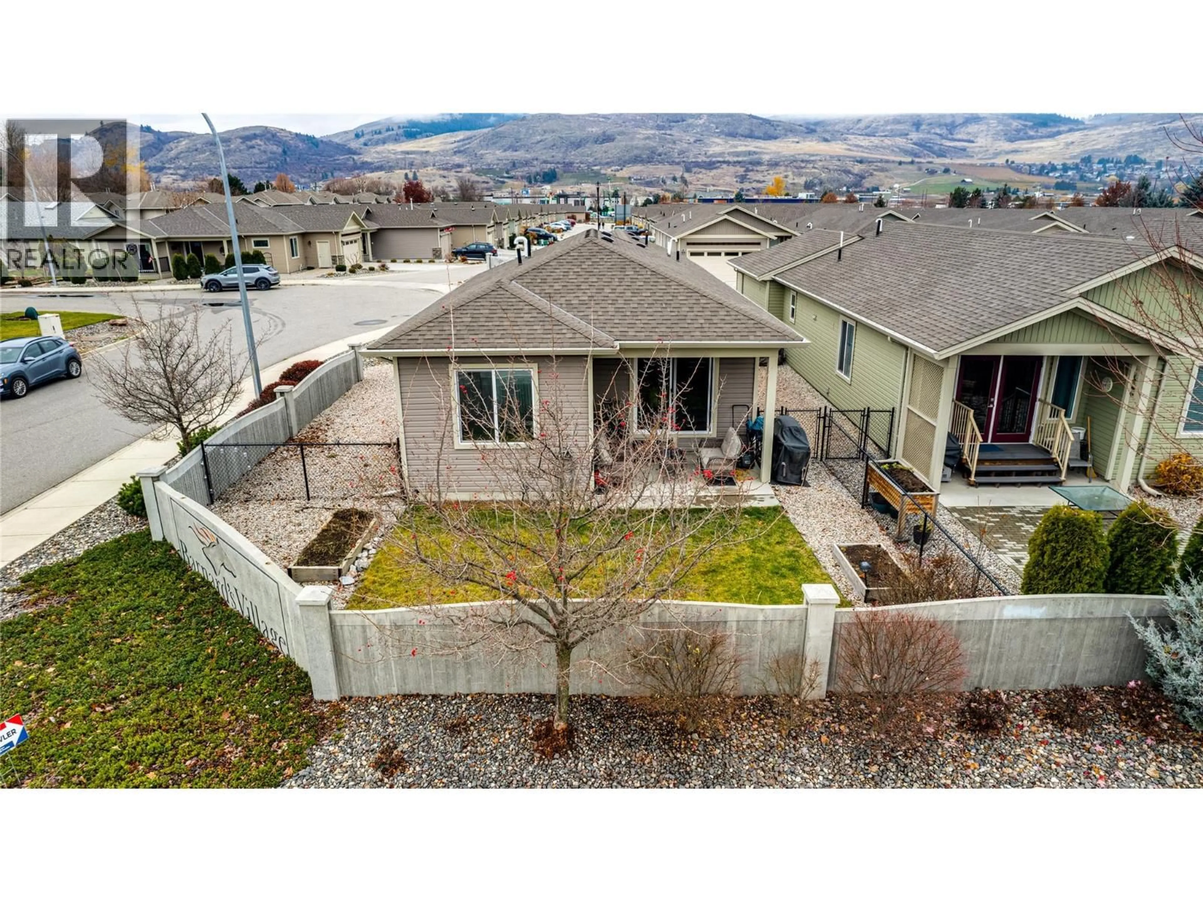 A pic from outside/outdoor area/front of a property/back of a property/a pic from drone, mountain view for 77 - 2100 55 AVENUE, Vernon British Columbia V1T9Y6
