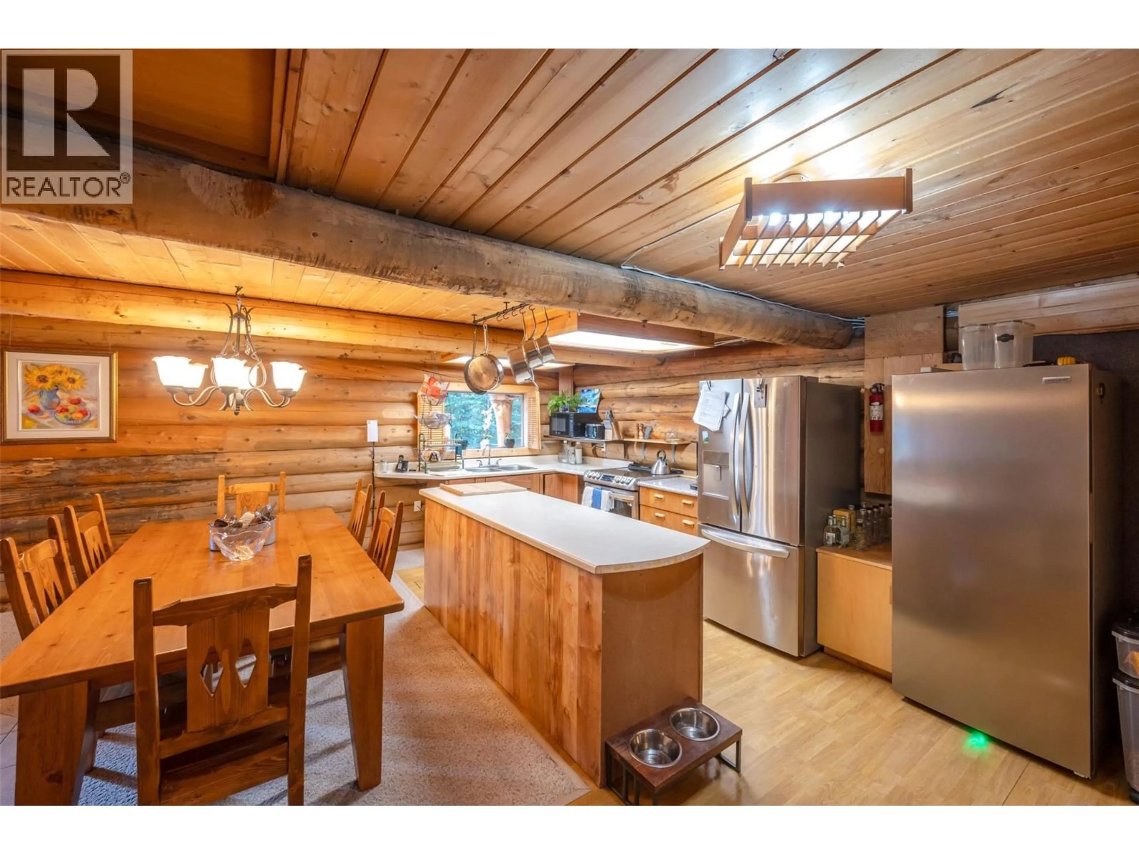 Rustic kitchen, wood/laminate floor for 121 THE CIRCLE, Apex Mountain British Columbia V2A0E2