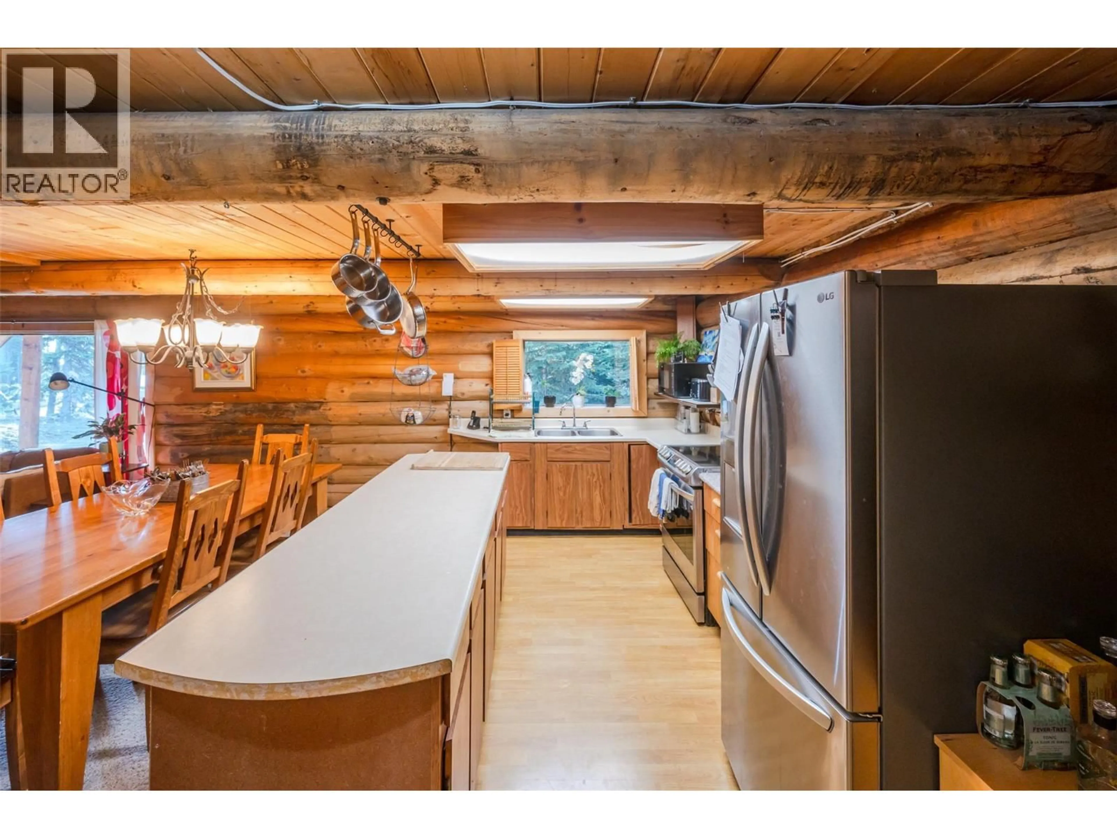 Open concept kitchen, wood/laminate floor for 121 THE CIRCLE, Apex Mountain British Columbia V2A0E2