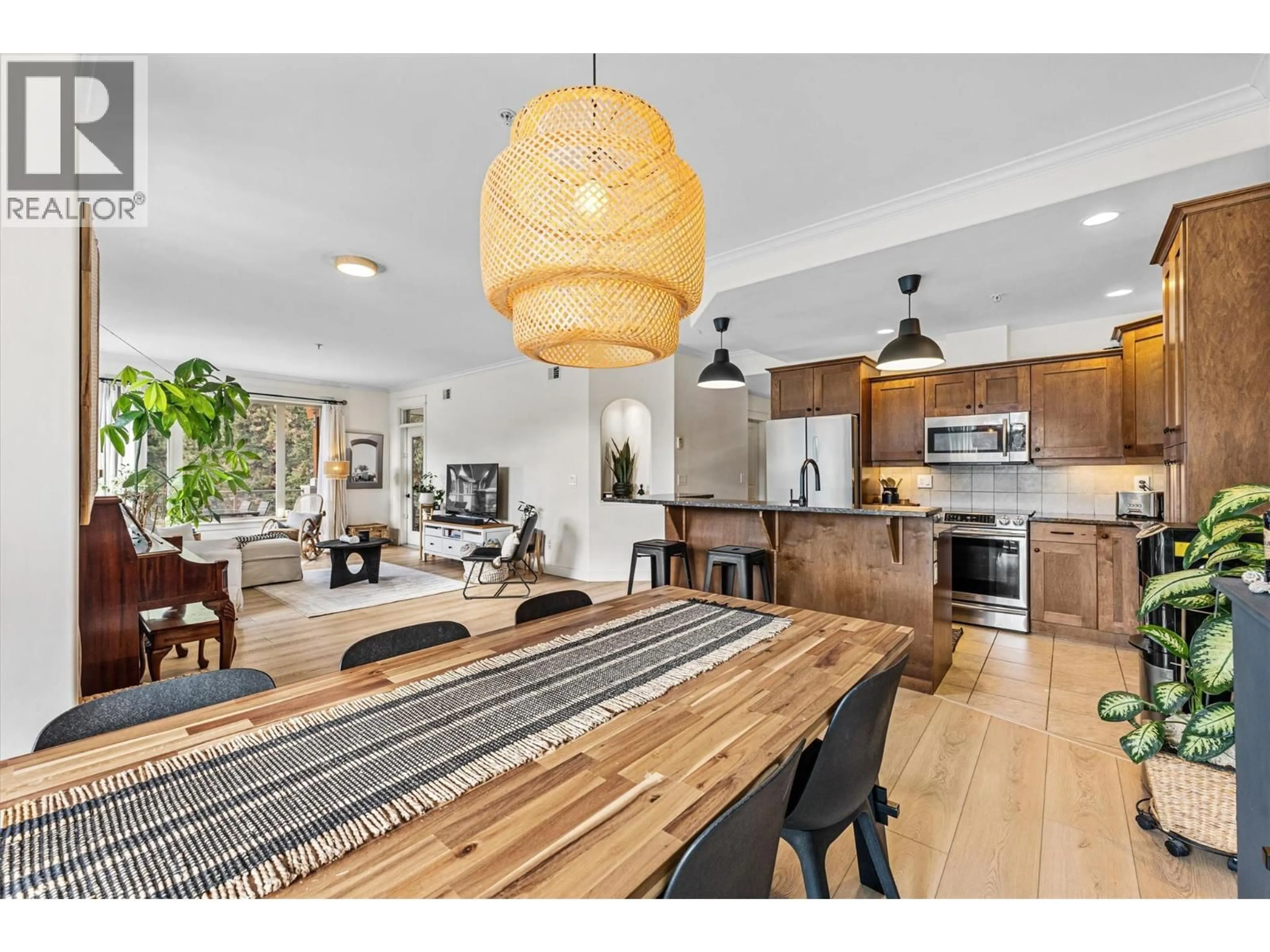 Open concept kitchen, wood/laminate floor for 201 - 2470 TUSCANY DRIVE, West Kelowna British Columbia V4T3G8