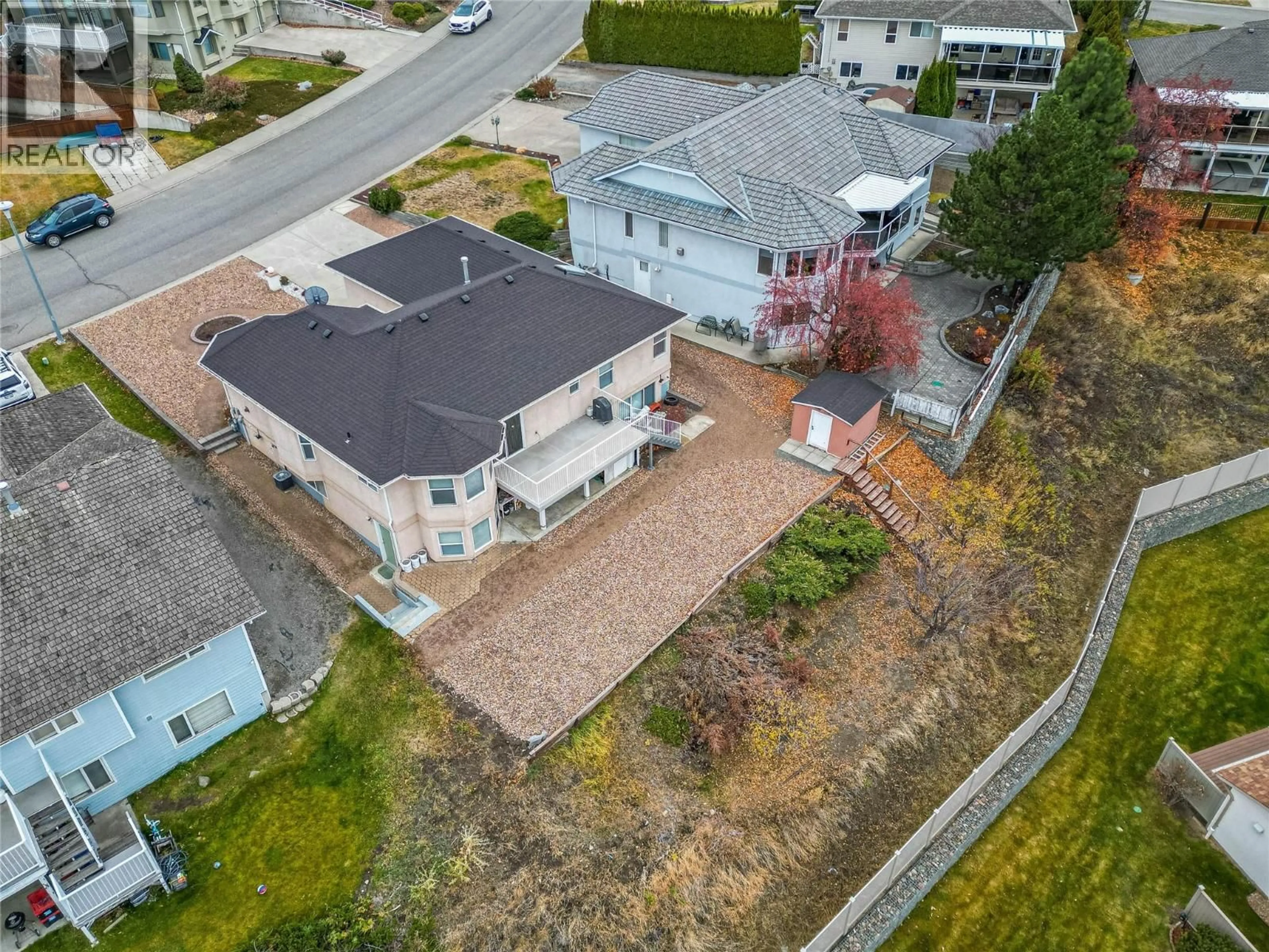 A pic from outside/outdoor area/front of a property/back of a property/a pic from drone, street for 1976 GLOAMING DRIVE, Kamloops British Columbia V1S1P8