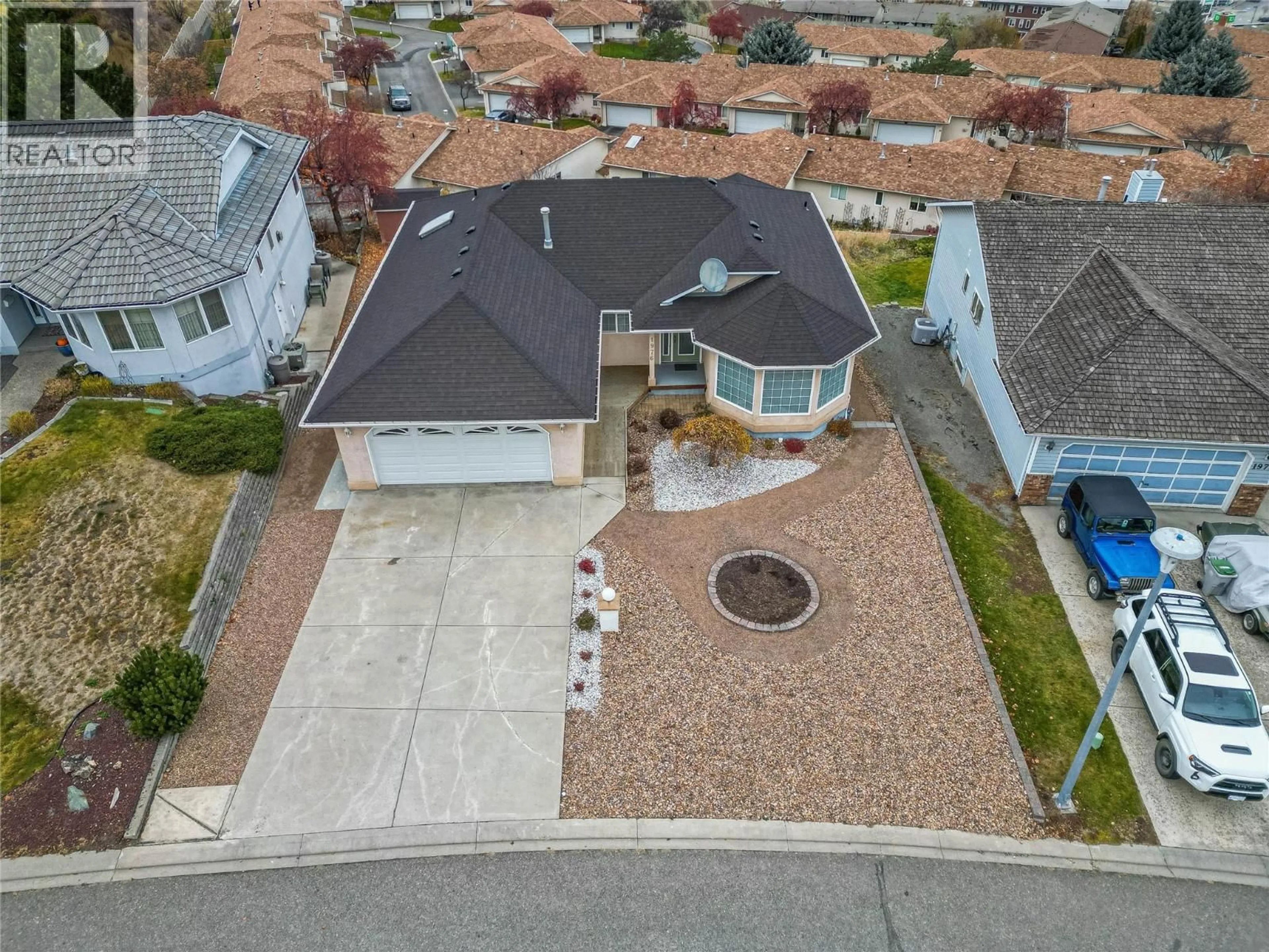 A pic from outside/outdoor area/front of a property/back of a property/a pic from drone, street for 1976 GLOAMING DRIVE, Kamloops British Columbia V1S1P8