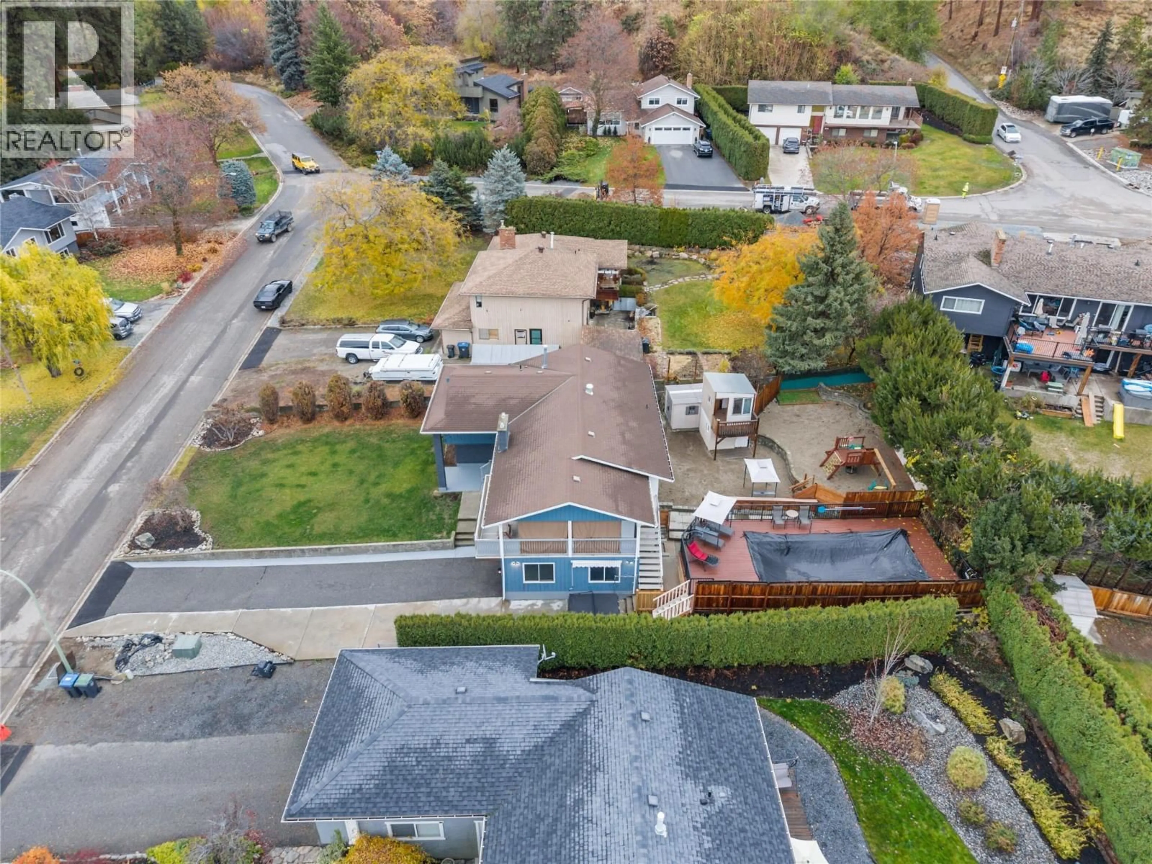 A pic from outside/outdoor area/front of a property/back of a property/a pic from drone, street for 2555 O'REILLY ROAD, Kelowna British Columbia V1W2V5