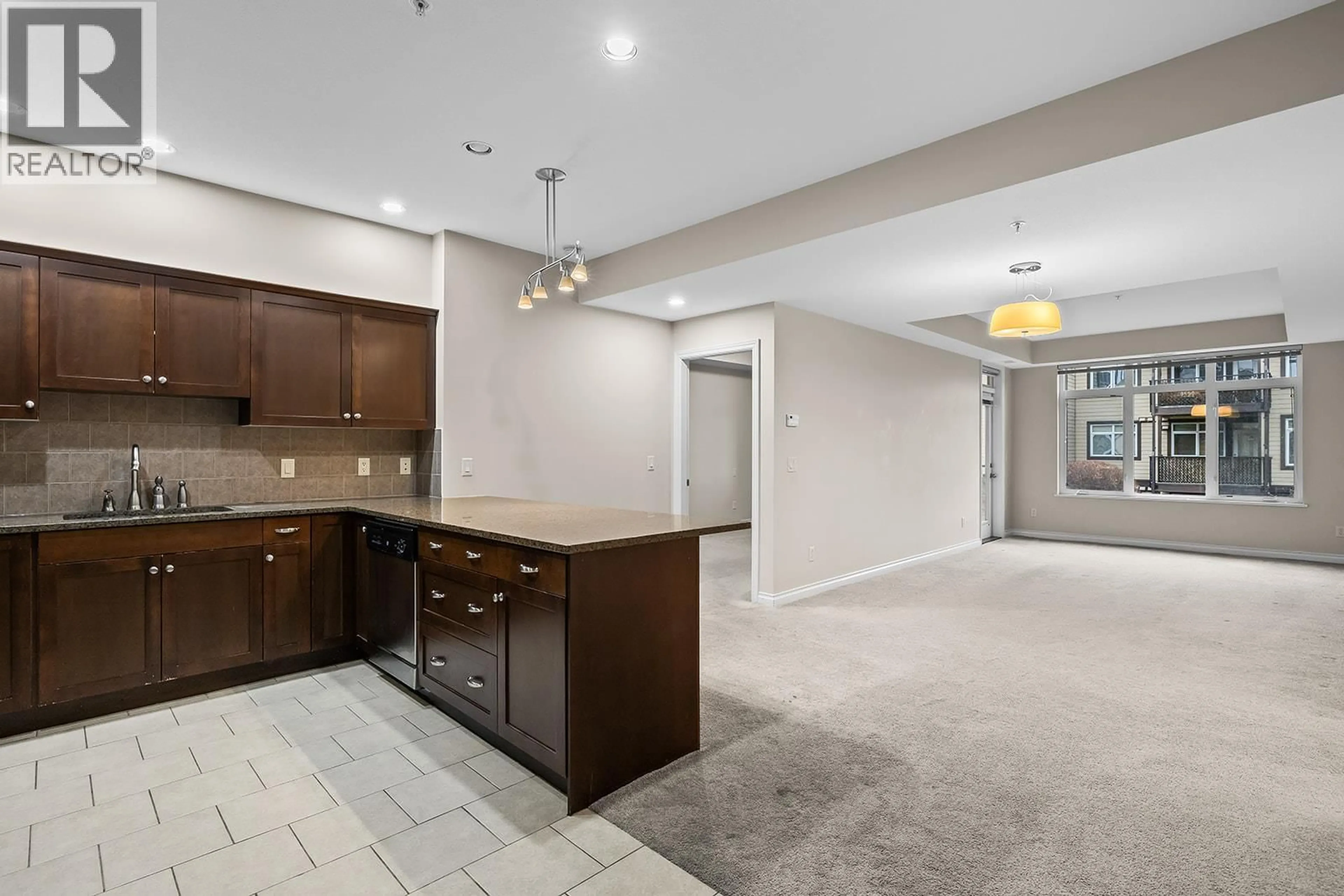 Open concept kitchen, ceramic/tile floor for 2211 - 3843 BROWN ROAD, West Kelowna British Columbia V4Y2J3