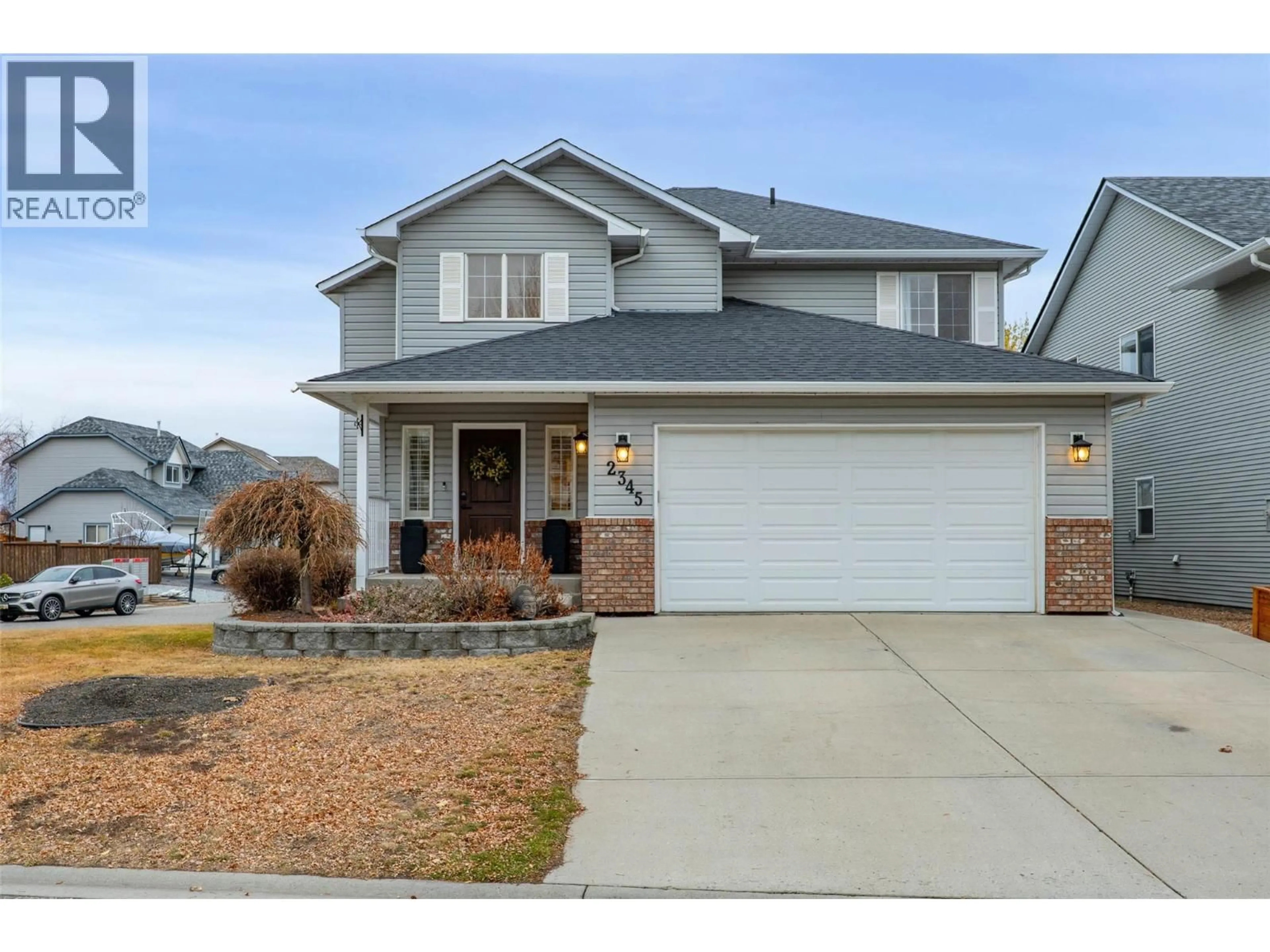 Home with vinyl exterior material, street for 2345 BRAMBLE LANE, Kamloops British Columbia V1S1Y6