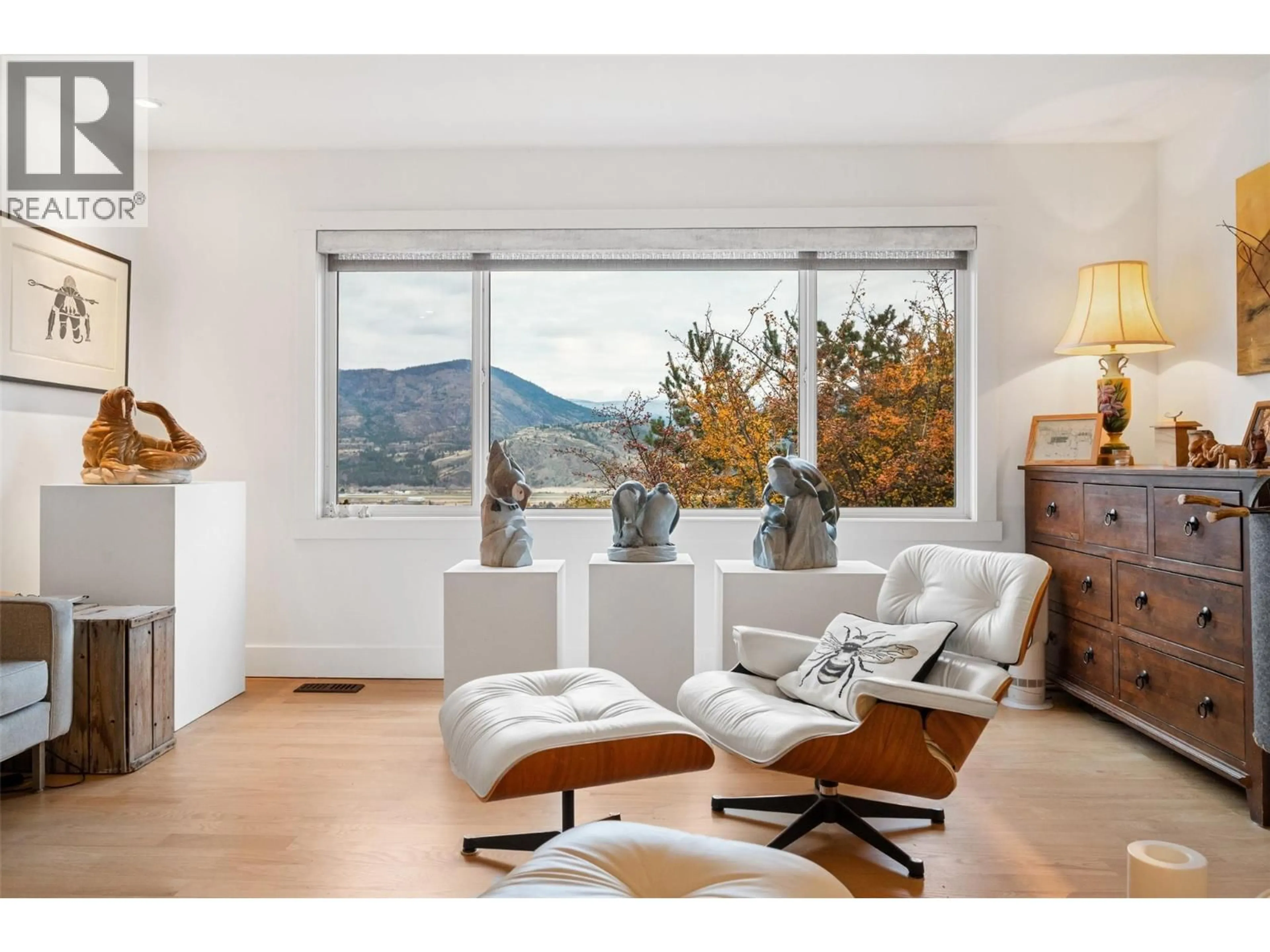 Living room with furniture, wood/laminate floor for 162 DARTMOUTH PLACE, Penticton British Columbia V2A7S4
