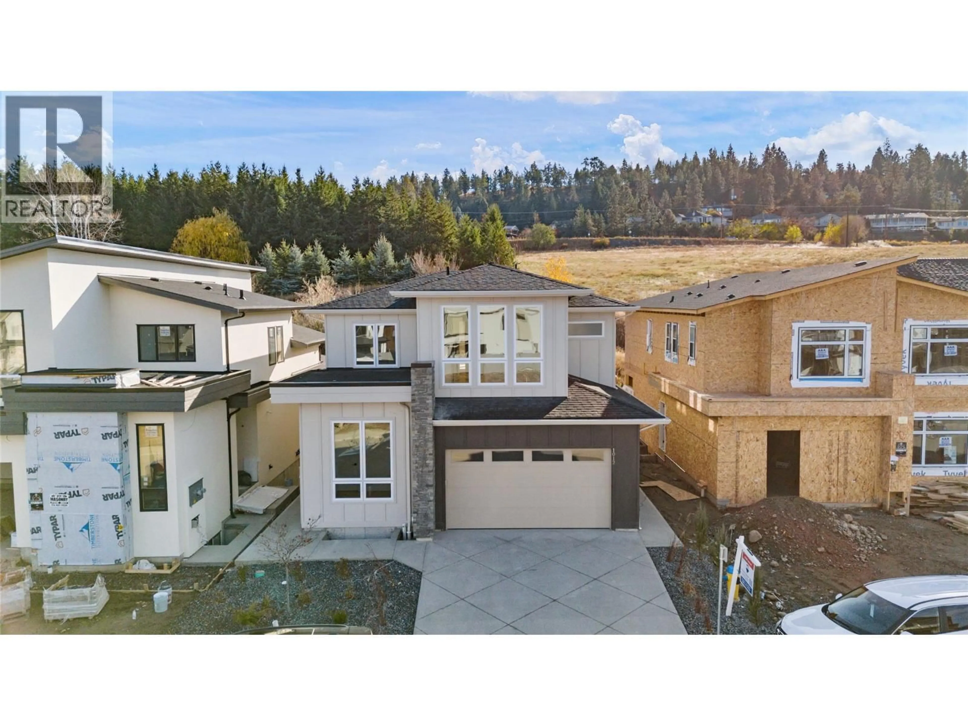 A pic from outside/outdoor area/front of a property/back of a property/a pic from drone, mountain view for 1012 BULL CRESCENT, Kelowna British Columbia V1W0E6