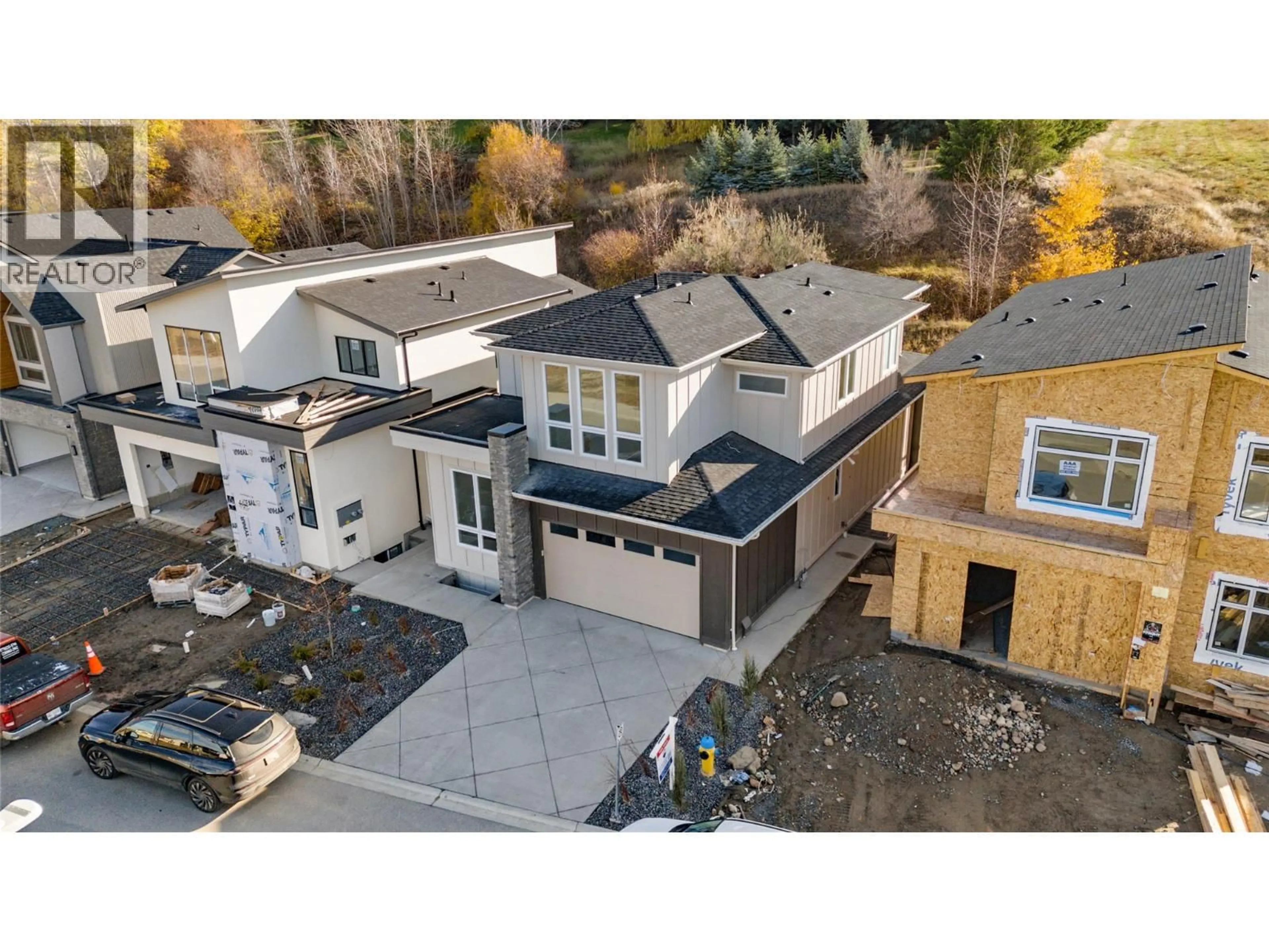 A pic from outside/outdoor area/front of a property/back of a property/a pic from drone, unknown for 1012 BULL CRESCENT, Kelowna British Columbia V1W0E6