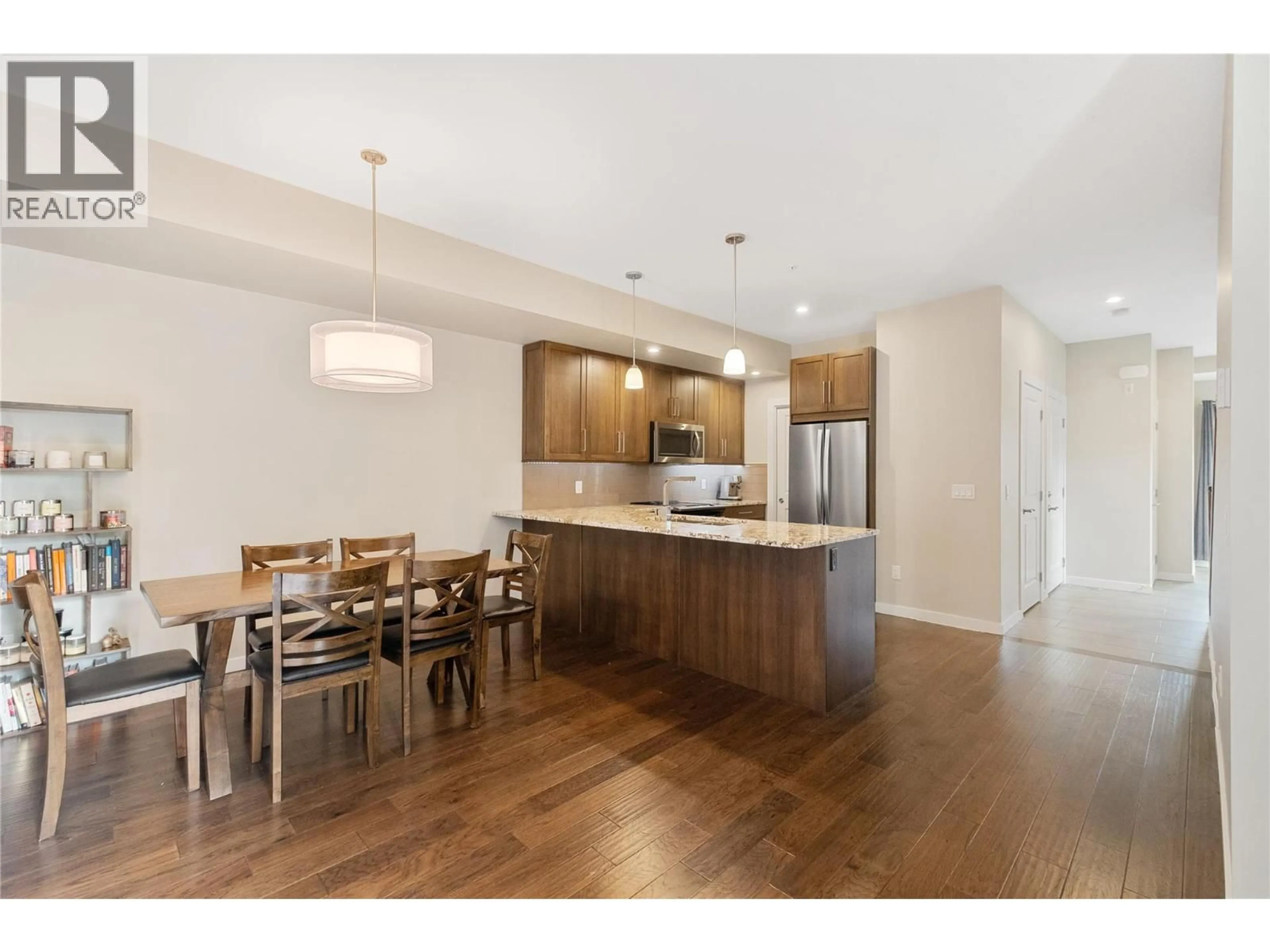 Open concept kitchen, wood/laminate floor for 87 - 600 BOYNTON PLACE, Kelowna British Columbia V1V3B8