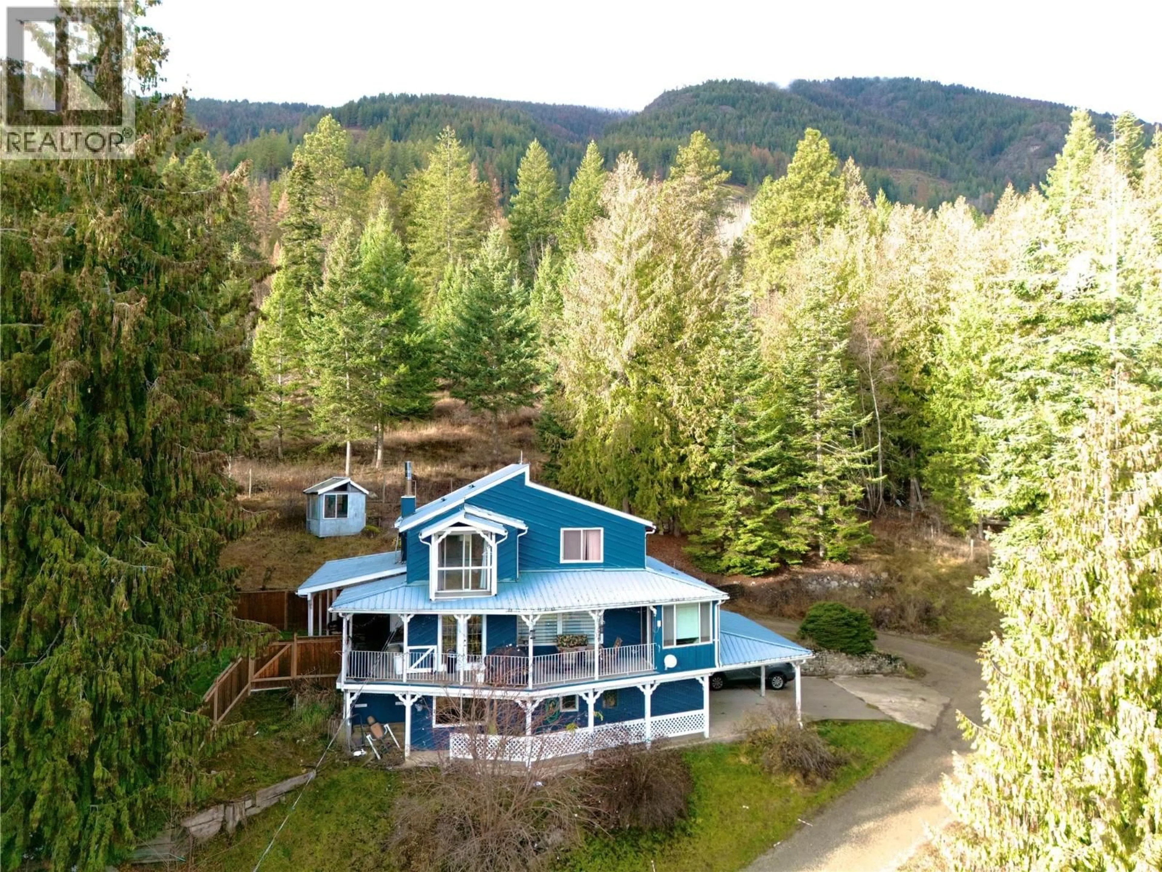 A pic from outside/outdoor area/front of a property/back of a property/a pic from drone, water/lake/river/ocean view for 1621 EVANS ROAD, Creston British Columbia V0B1G7