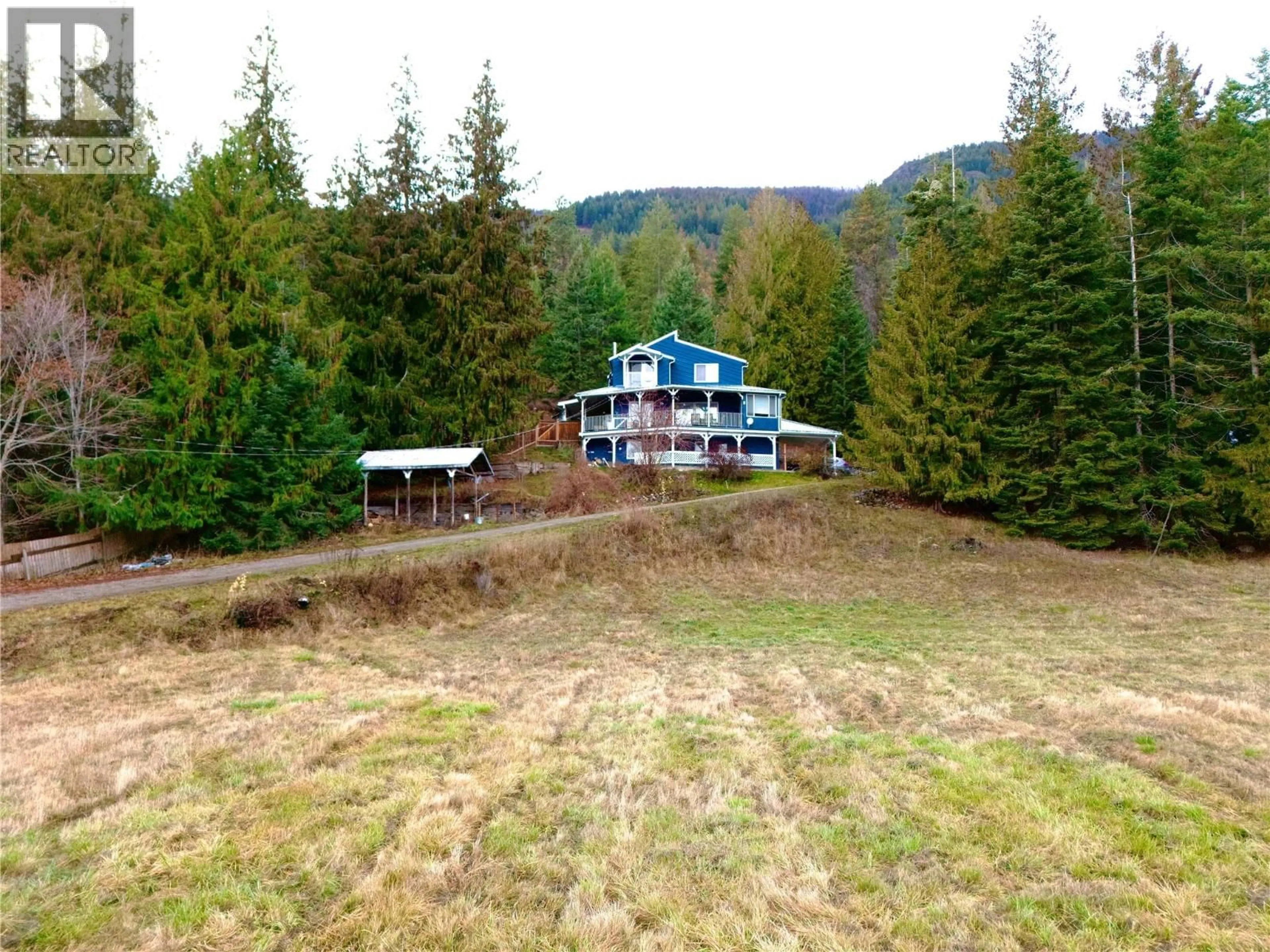 A pic from outside/outdoor area/front of a property/back of a property/a pic from drone, mountain view for 1621 EVANS ROAD, Creston British Columbia V0B1G7