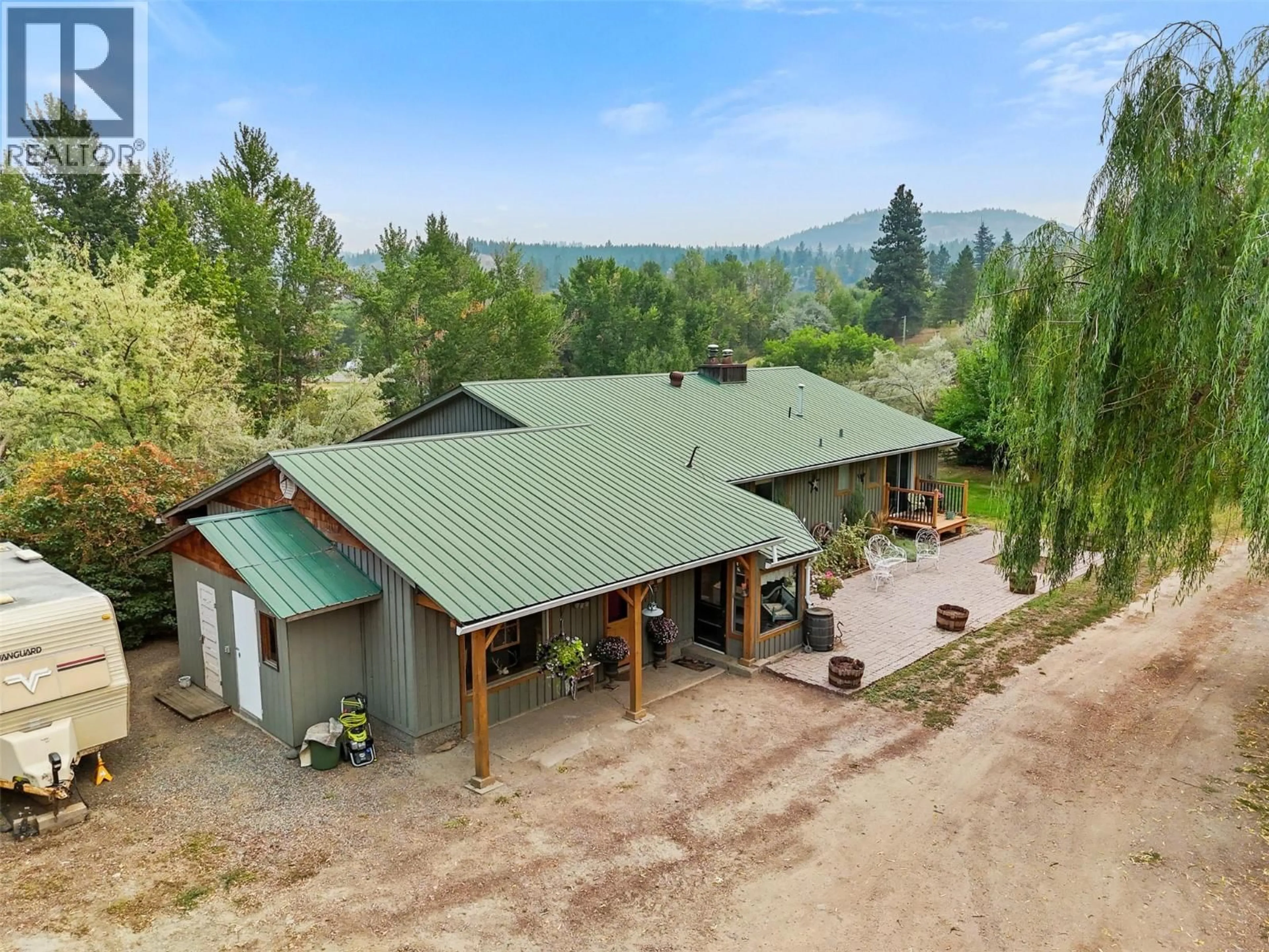 A pic from outside/outdoor area/front of a property/back of a property/a pic from drone, mountain view for 1580 MONTE CREEK ROAD, Kamloops British Columbia V0E2M0