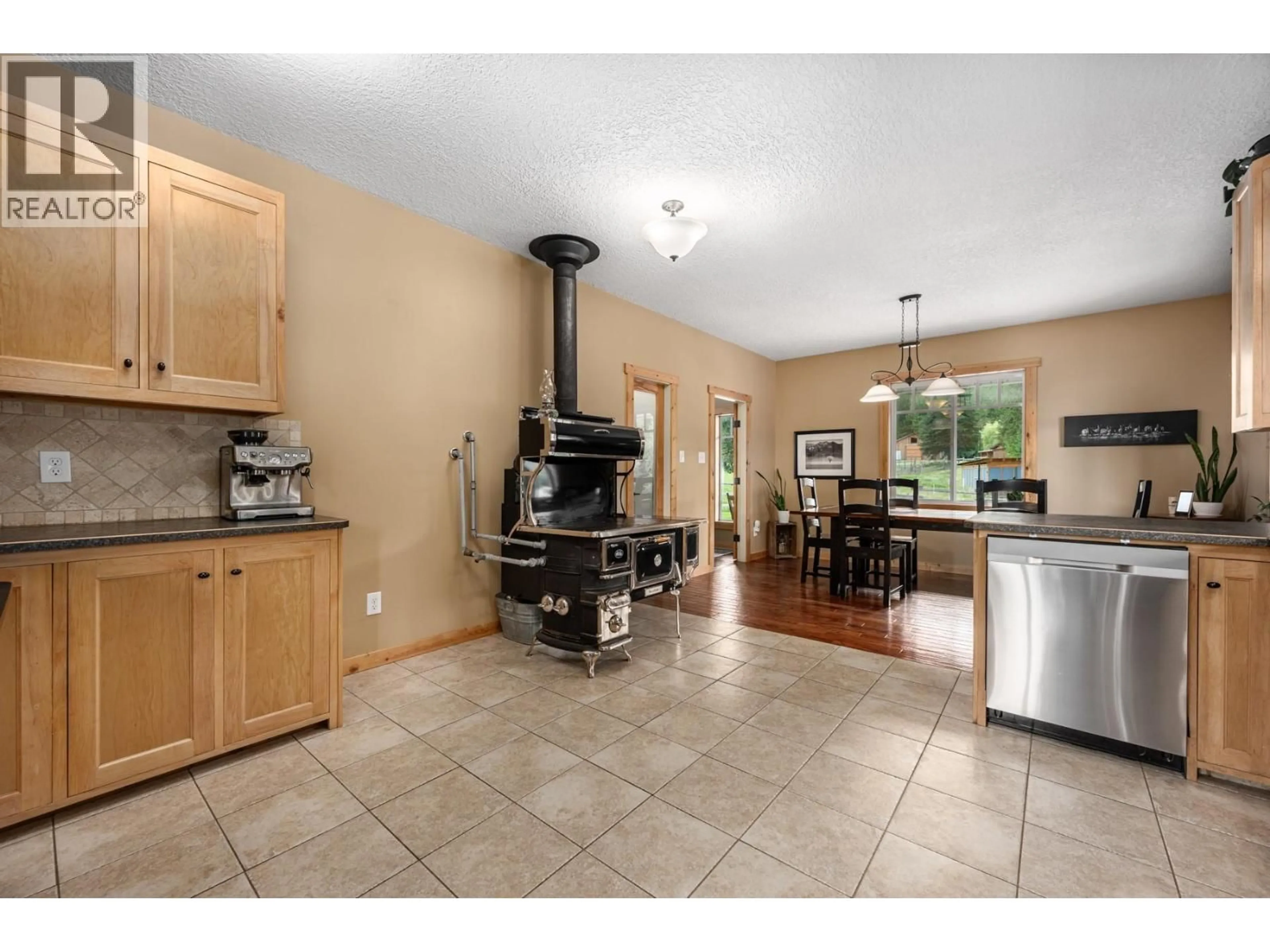 Open concept kitchen, ceramic/tile floor for 380 RICHLANDS ROAD, Cherryville British Columbia V0E2G1