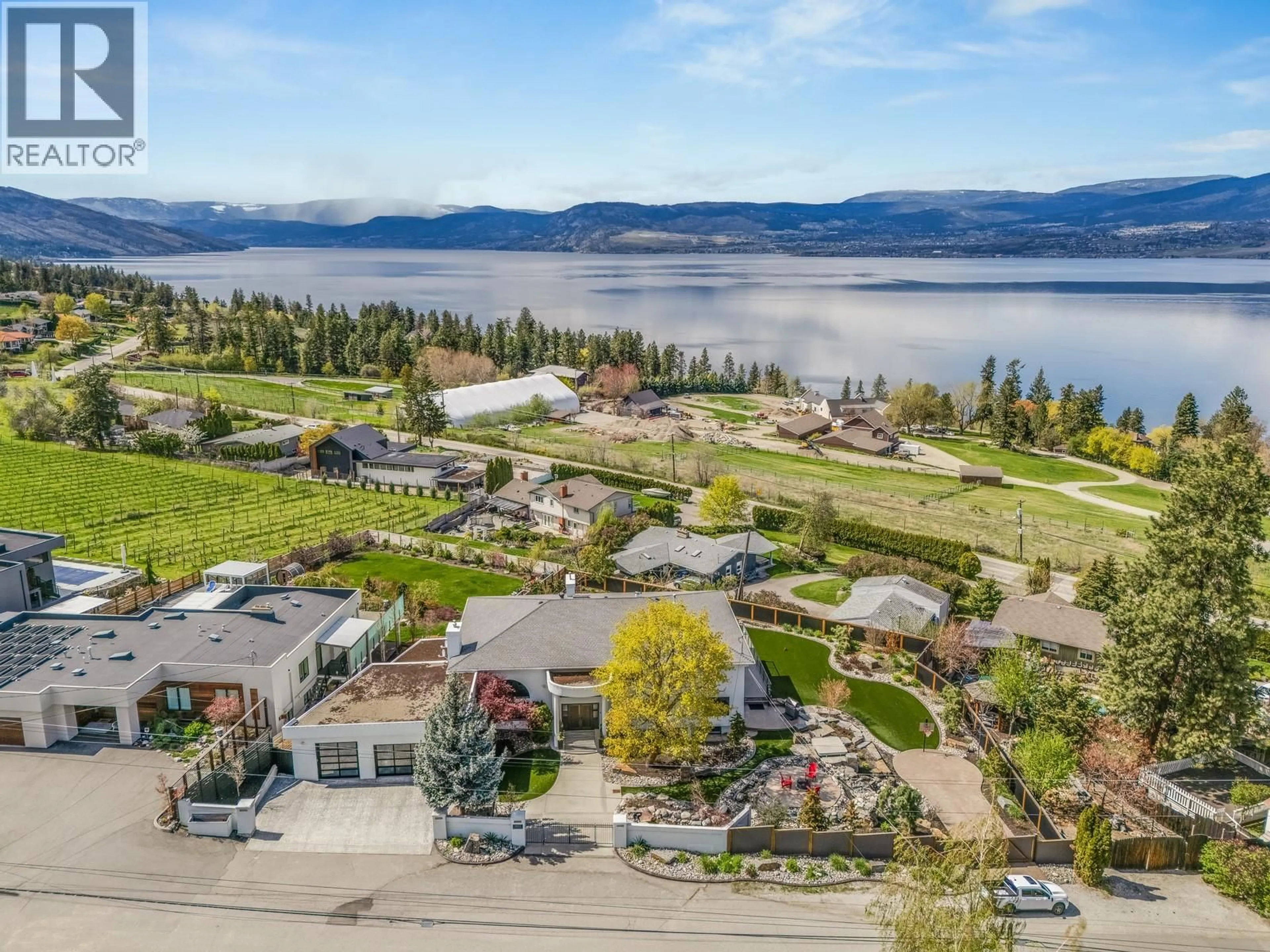 A pic from outside/outdoor area/front of a property/back of a property/a pic from drone, water/lake/river/ocean view for 4812 LAKESHORE PLACE, Kelowna British Columbia V1W4H6