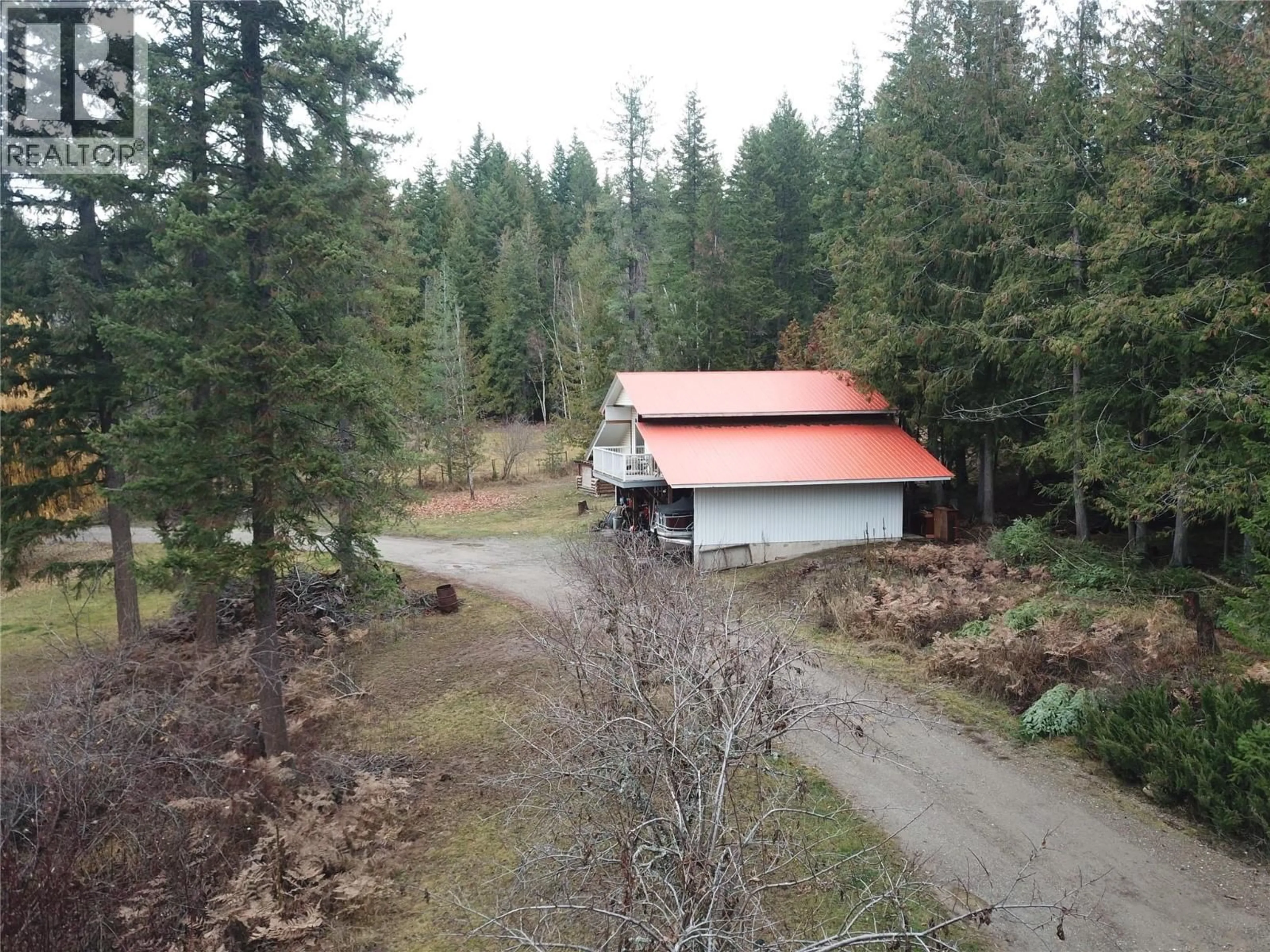A pic from outside/outdoor area/front of a property/back of a property/a pic from drone, forest/trees view for 2550 CODY ROAD, Magna Bay British Columbia V0E1M7
